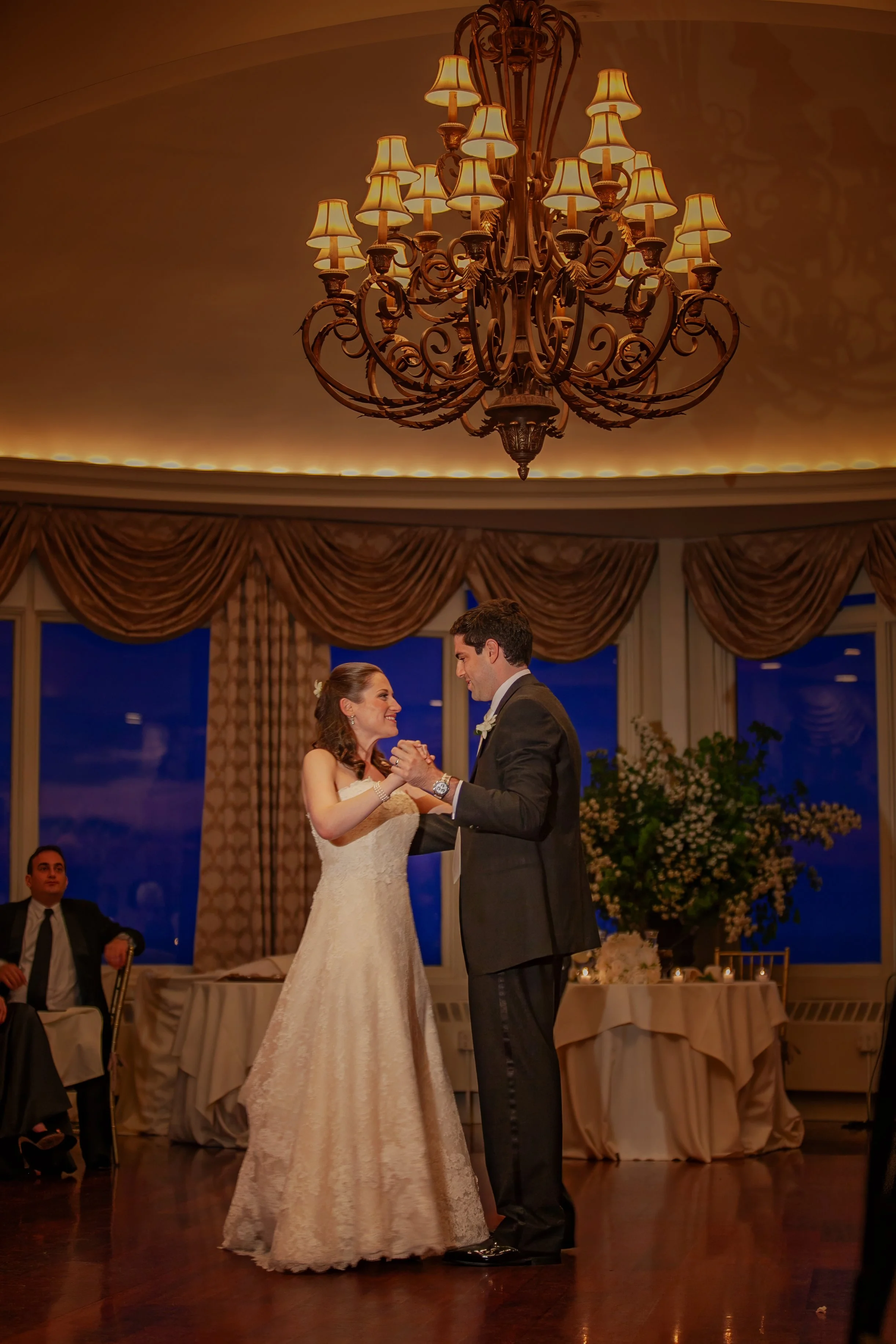 Bride and groom first dance in Ocean Cliff ballroom.