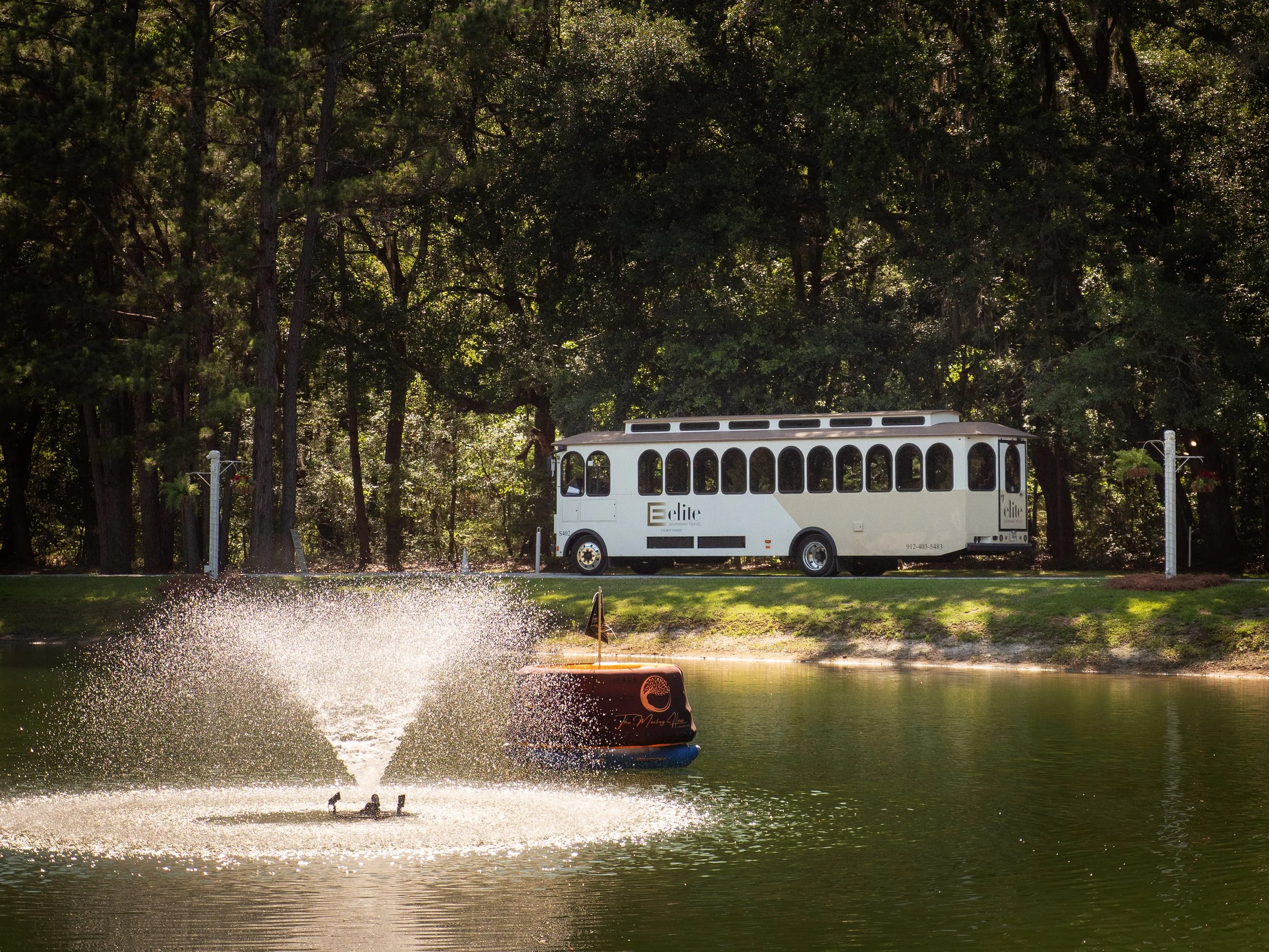 Elite Trolley transporting wedding guests between Downtown Savannah and The Mackey House wedding venue.