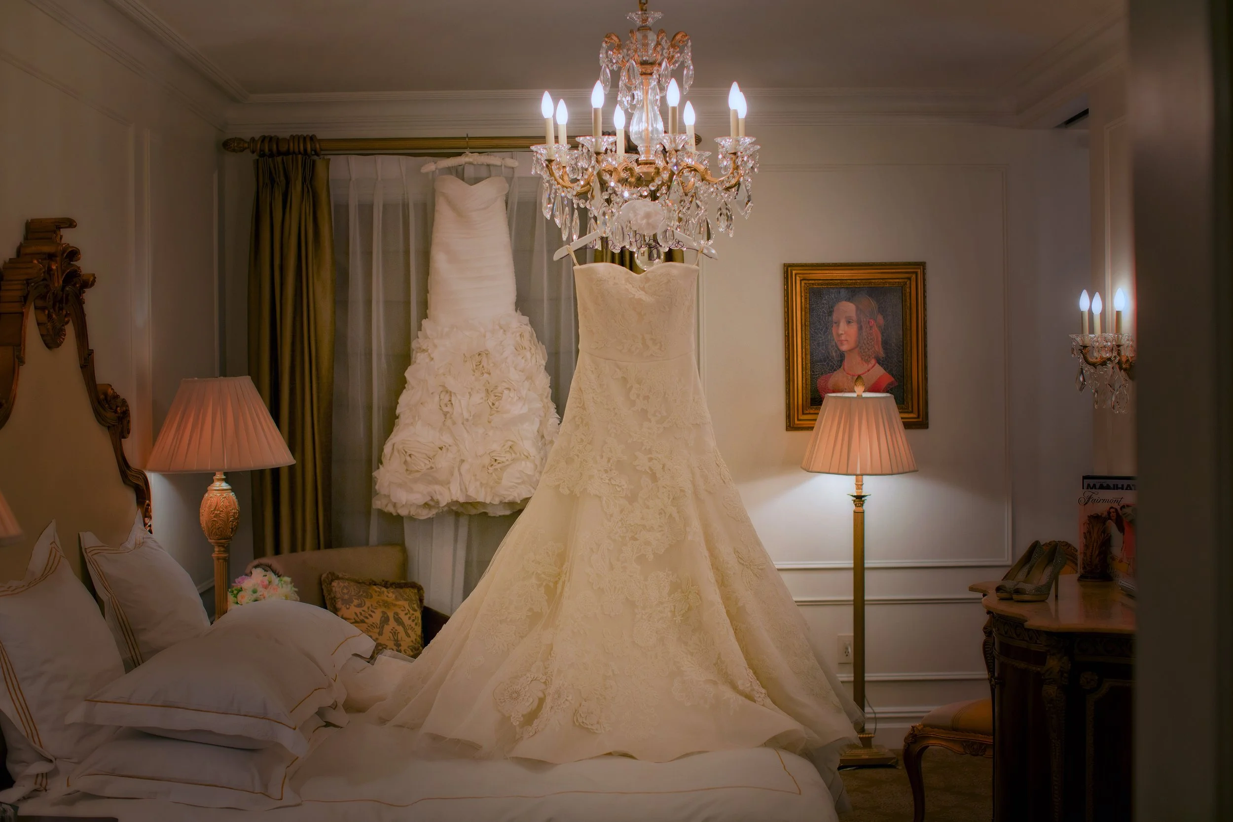 The wedding dresses hung with care in the bridal suite at The Plaza Hotel NYC