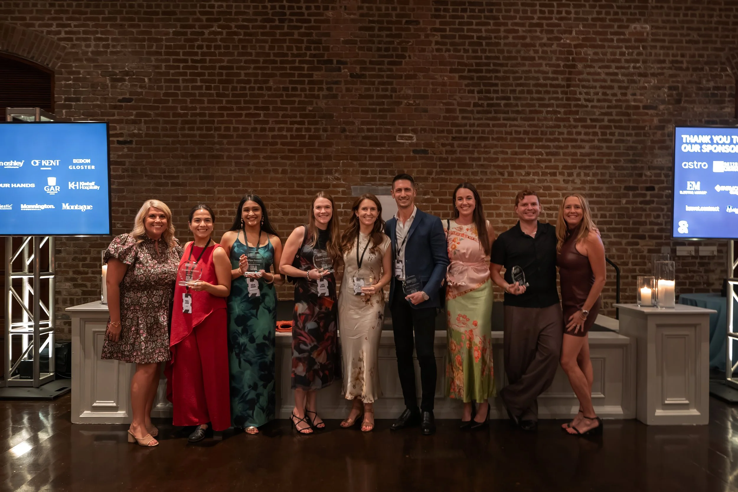 Stay and Gather award recipients and organizers posing together at the closing celebration.
