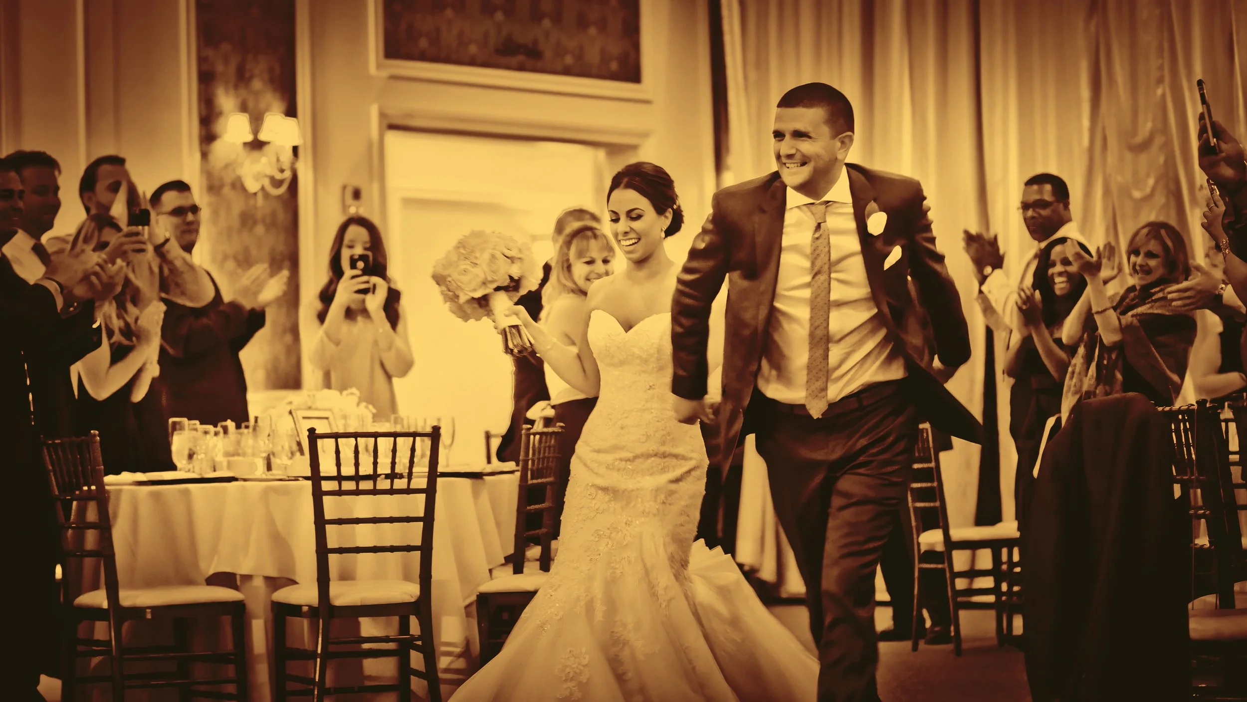 The bride and groom are announced into their wedding reception at The Grandview.