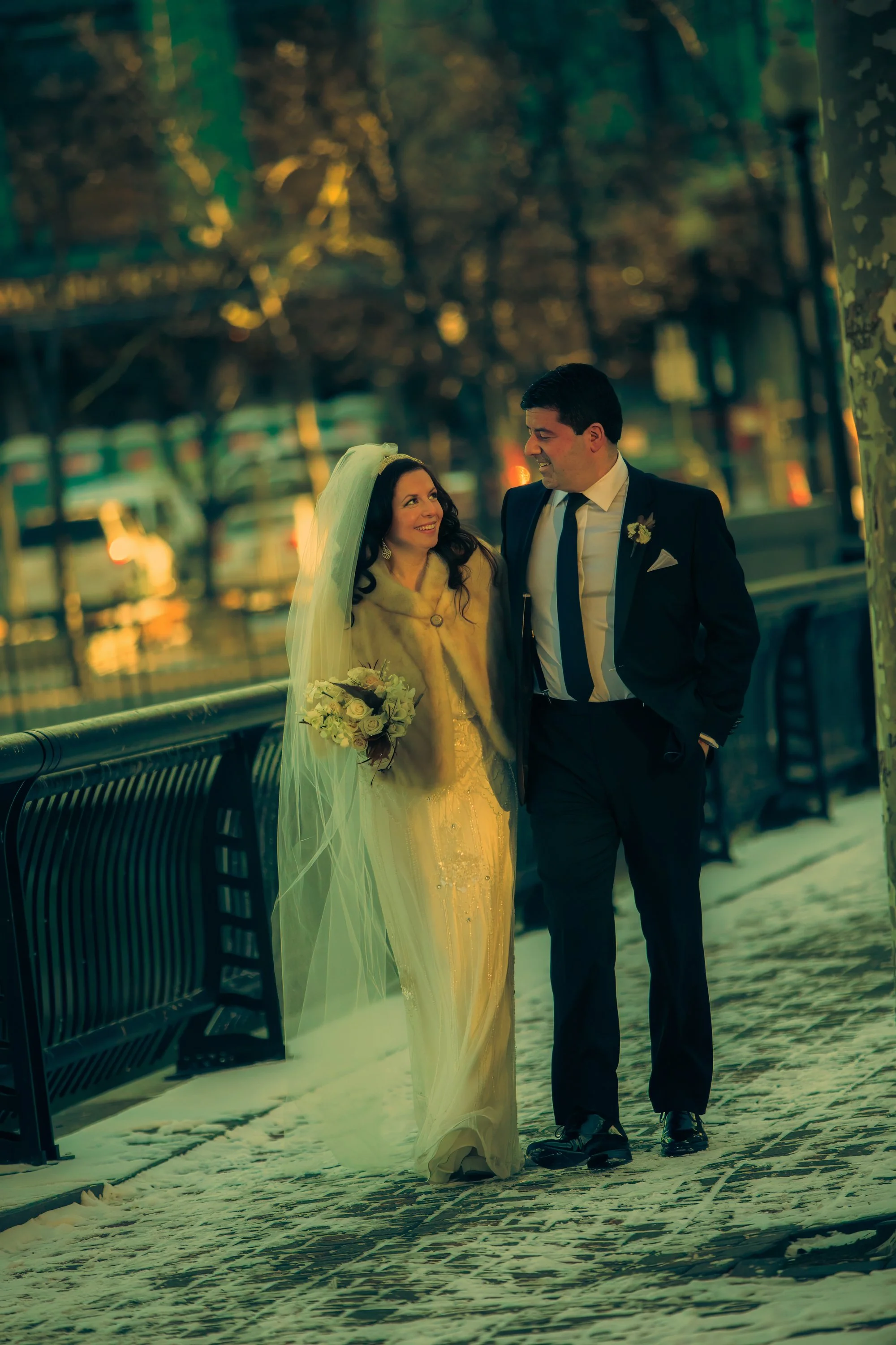 Bride and groom walking the streets outside W Hoboken as their photographer captures authentic moments.
