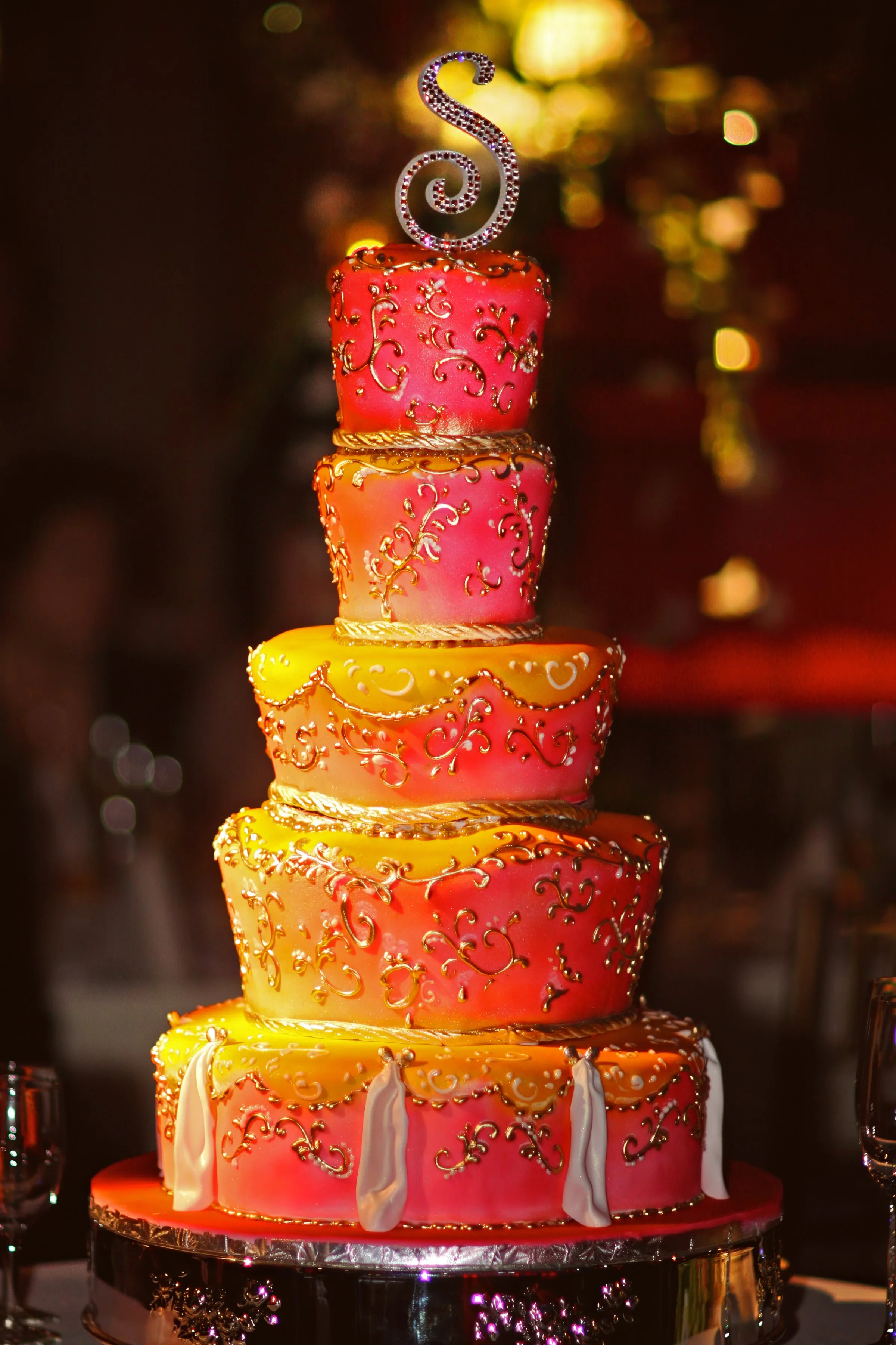 Colorful wedding cake displayed at an Angel Orensanz wedding reception in New York City.