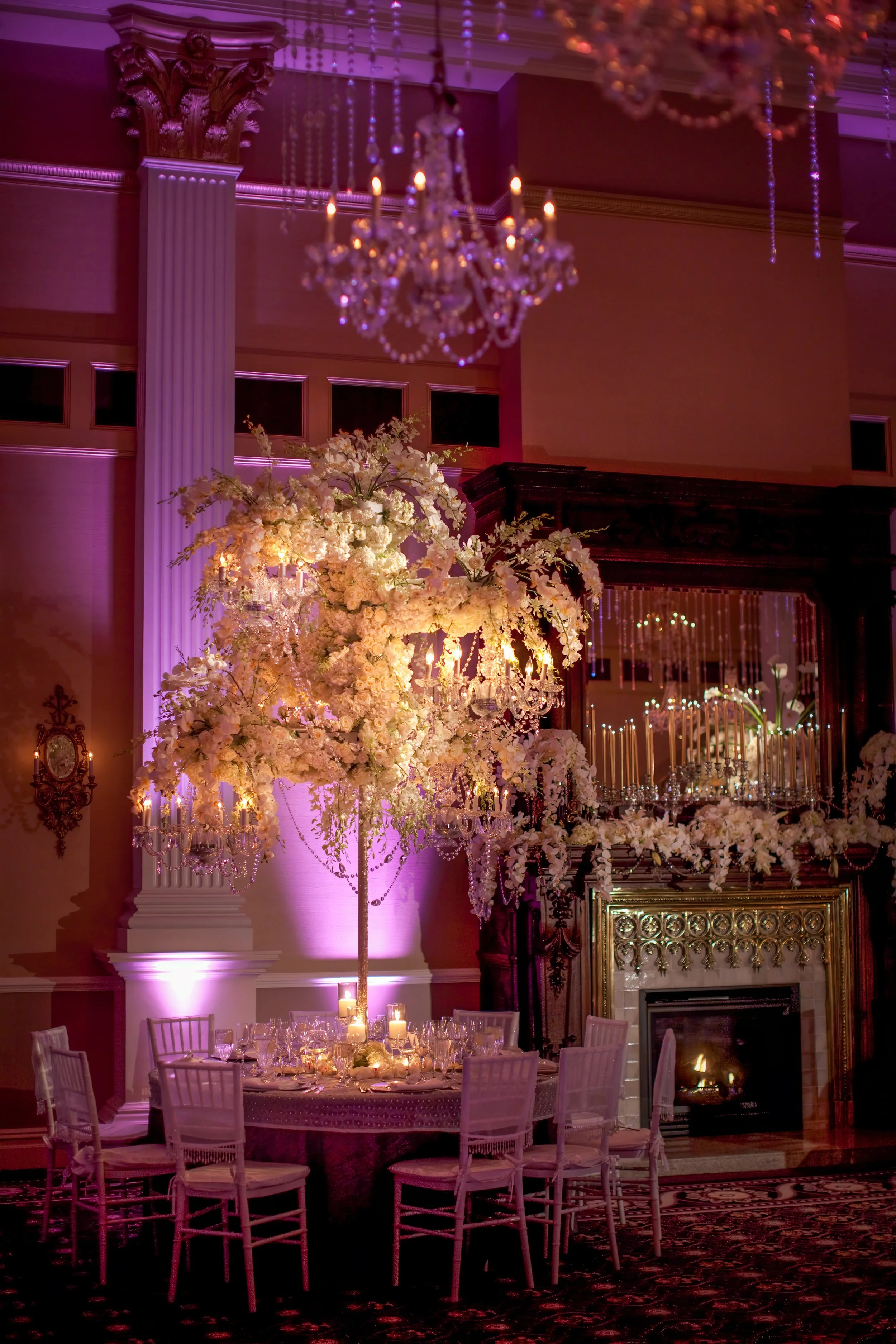 Luxurious ballroom decor and floral arrangements at The Palace at Somerset Park.