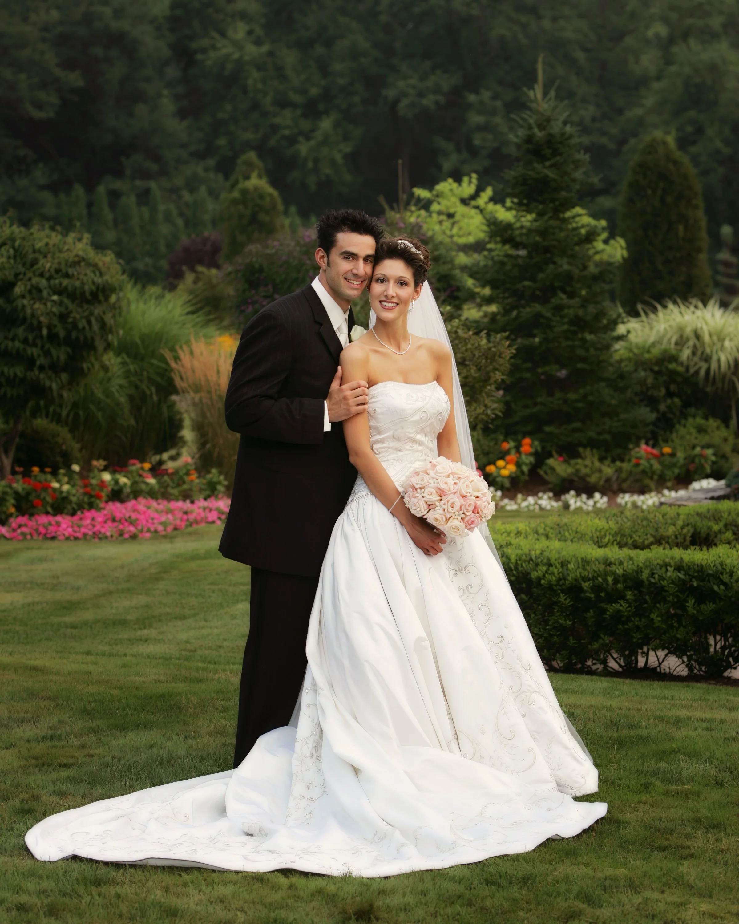 Full length bridal portraits on the landscaped grounds at Aqua Turf