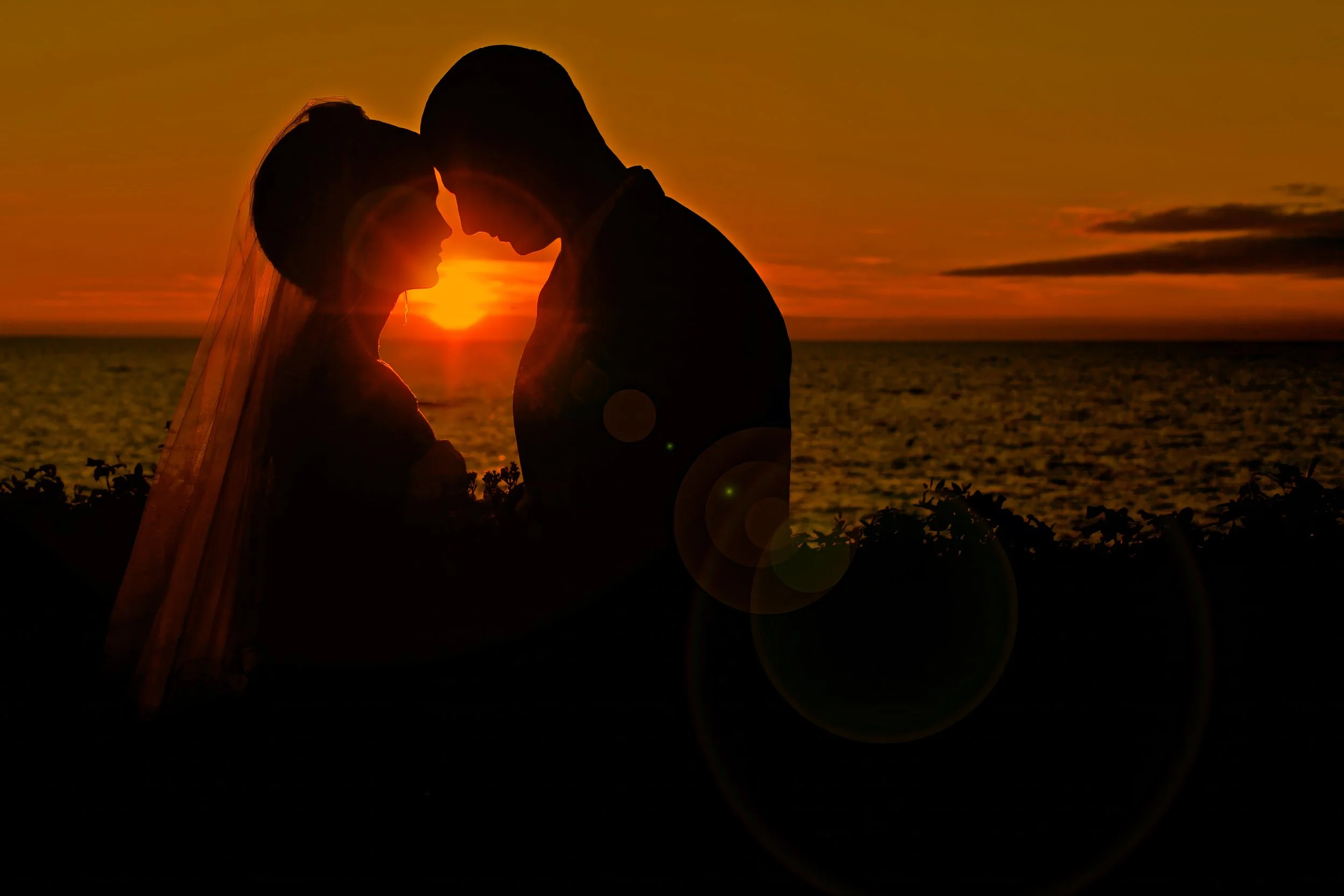 Tybee Island elopement packages sunrise silhouette bride and groom beach Savannah Georgia