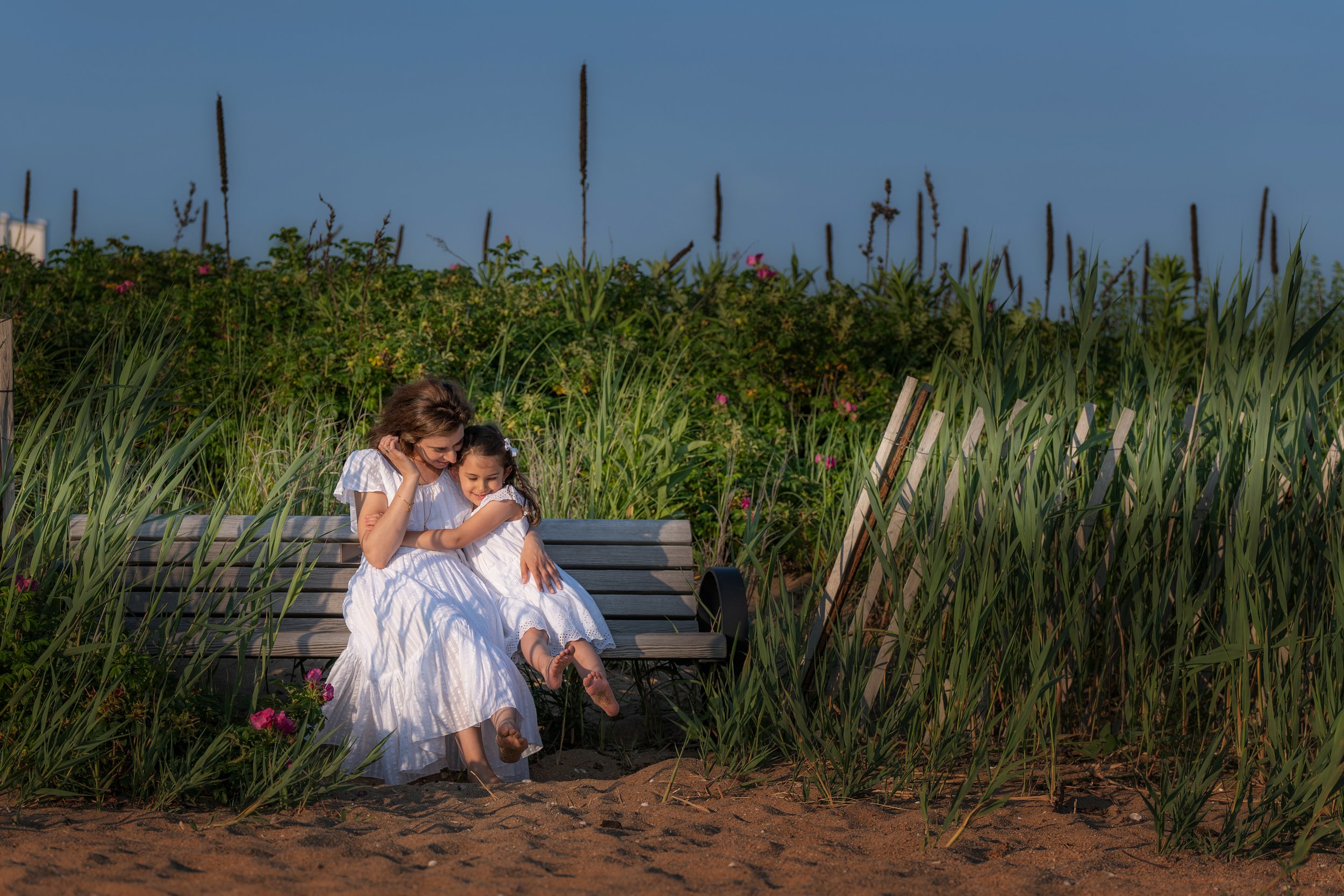 Mother and daughter family portrait on the beach in Madison, Connecticut
