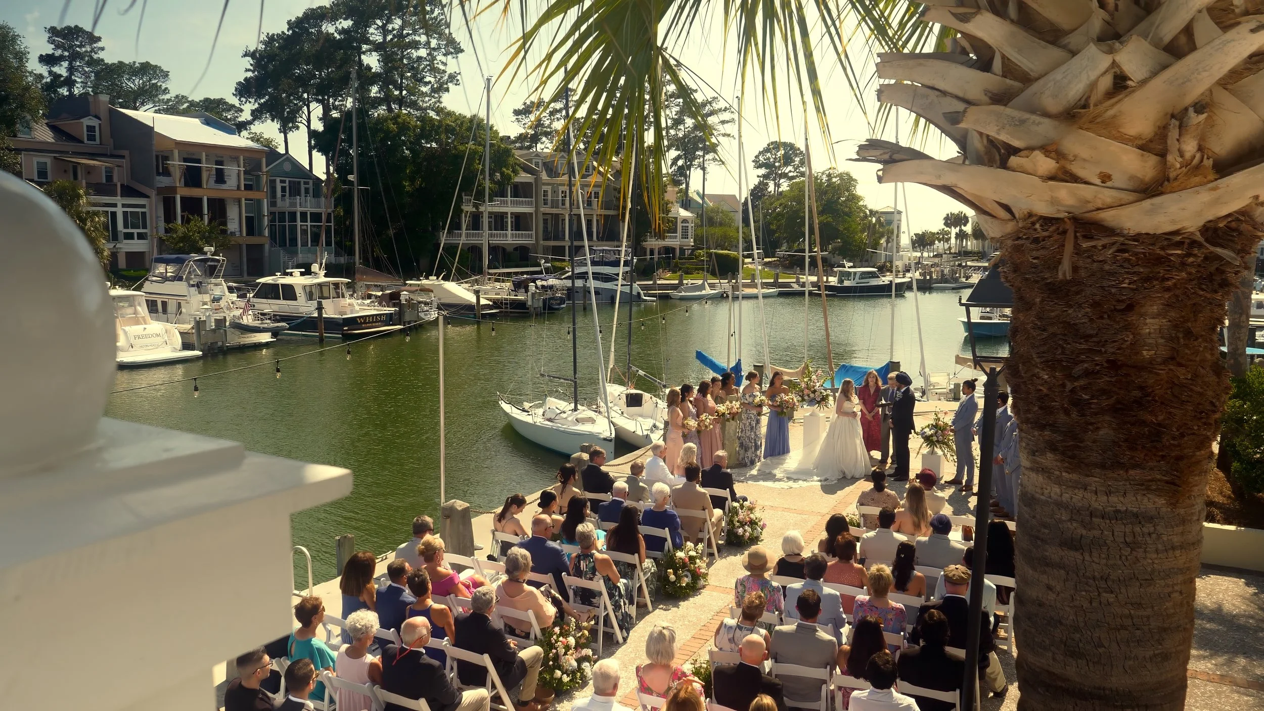 Outdoor marina wedding ceremony at South Carolina Yacht Club Hilton Head Island waterfront venue