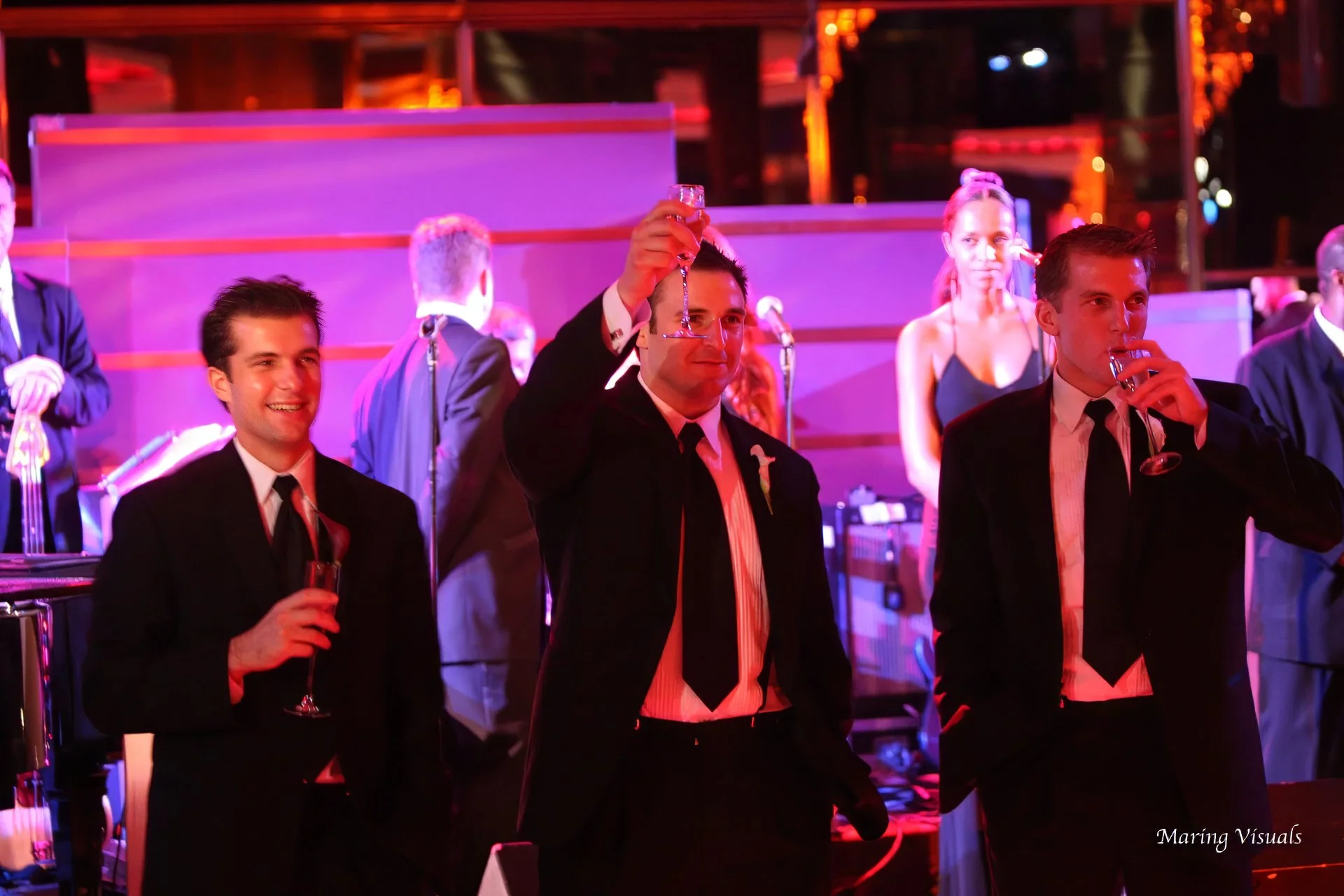 Toast the the bride and groom at a wedding at the Rainbow Room NYC