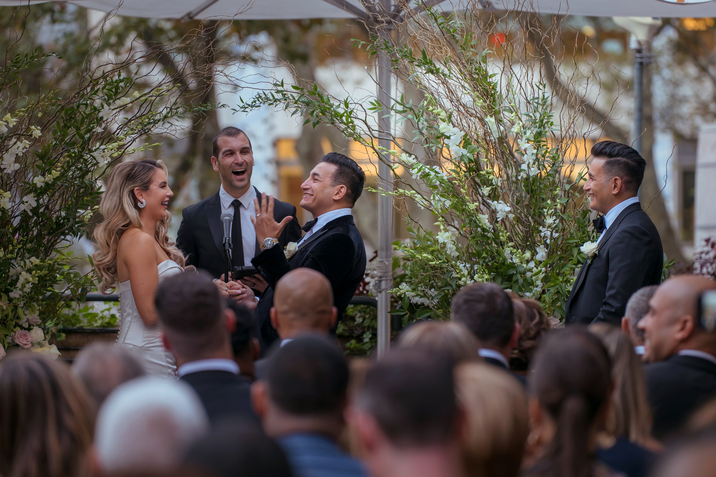 Emotional wedding ceremony moment on the terrace at Bryant Park Grill NYC wedding venue
