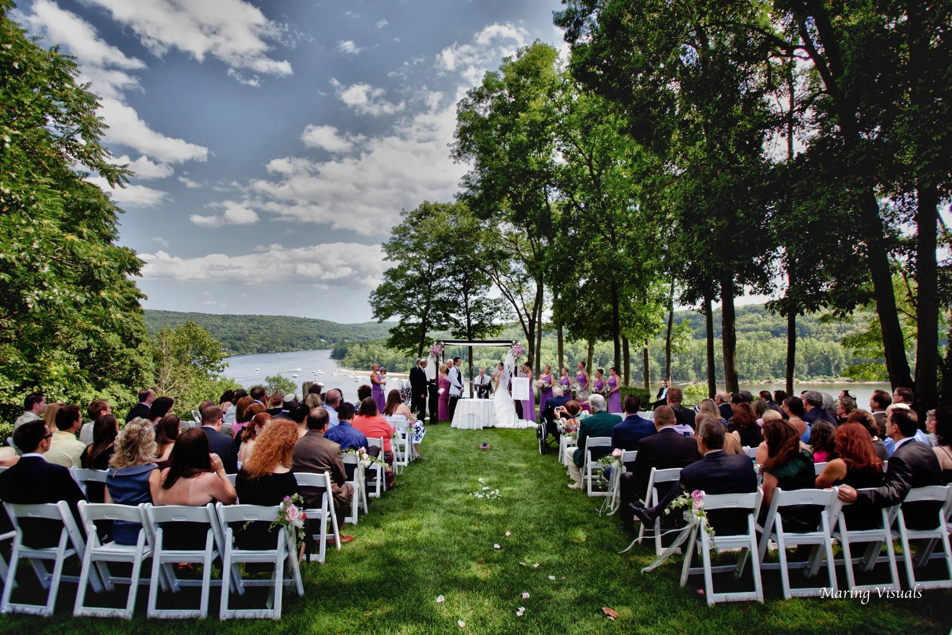Water front views of a wedding ceremony at Saint Clements Castle in Portland CT