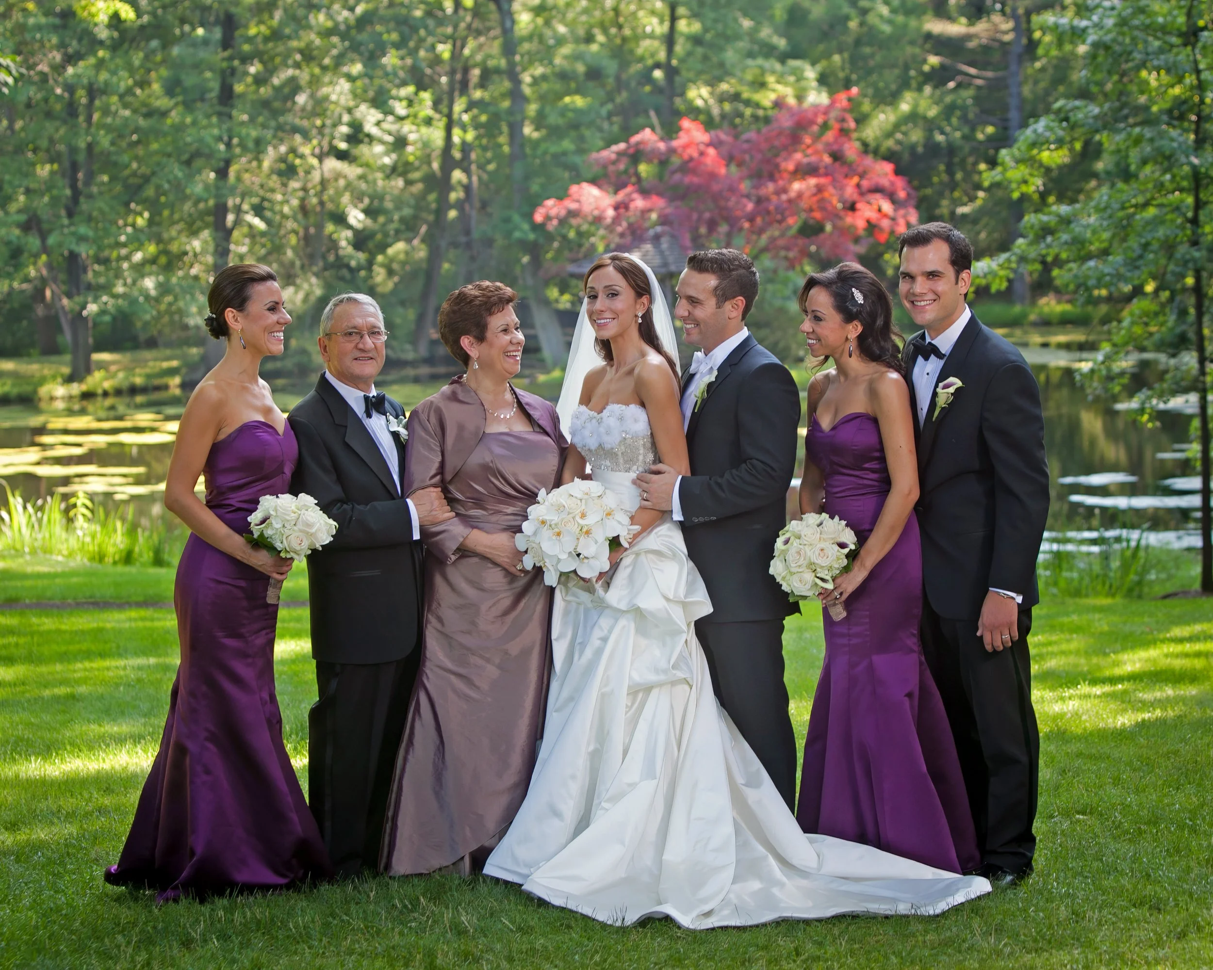 Family portraits taken by the pond on the grounds of Pleasantdale Chateau.