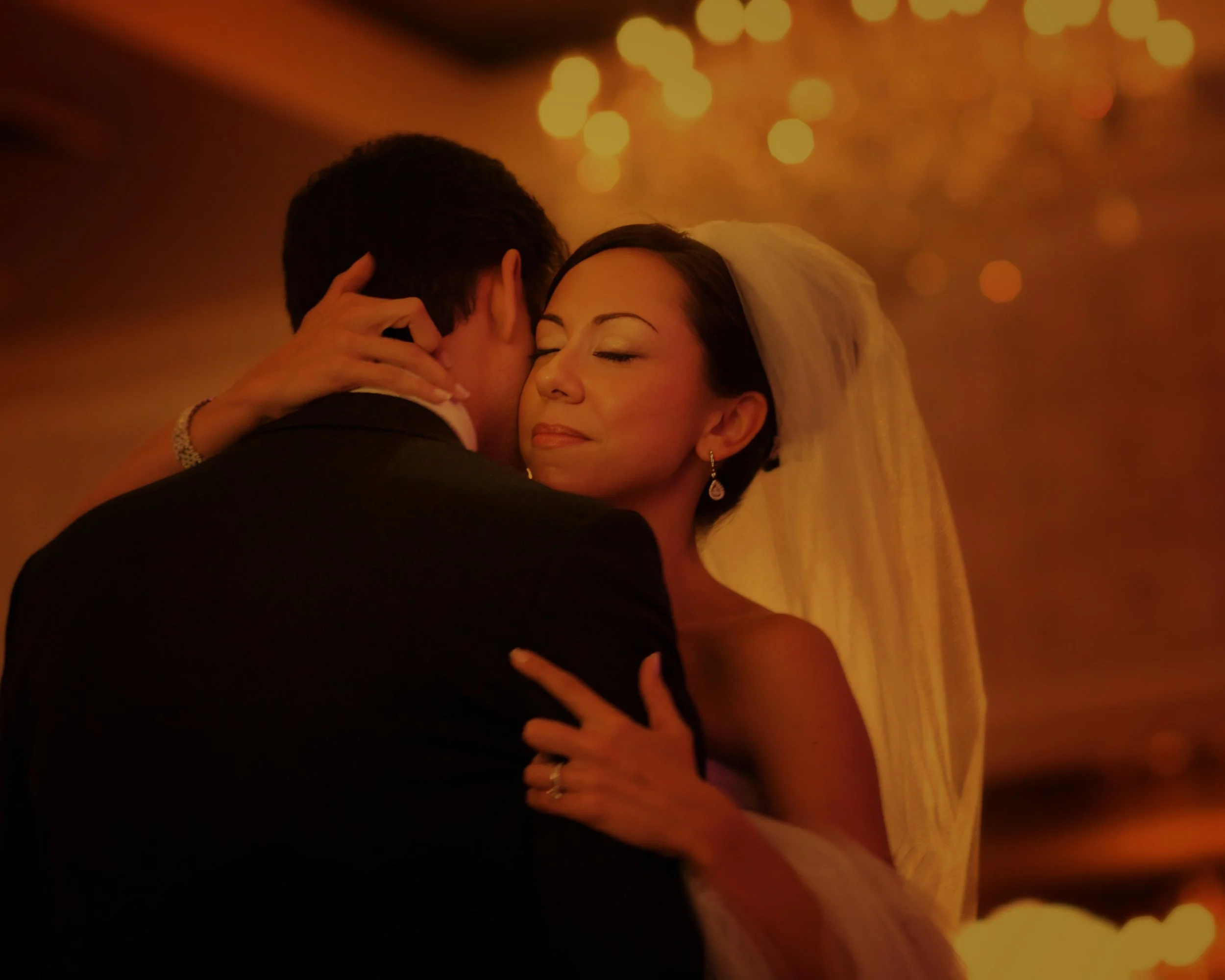 Color closeup of bride and groom dancing at the Omni New Haven Hotel.