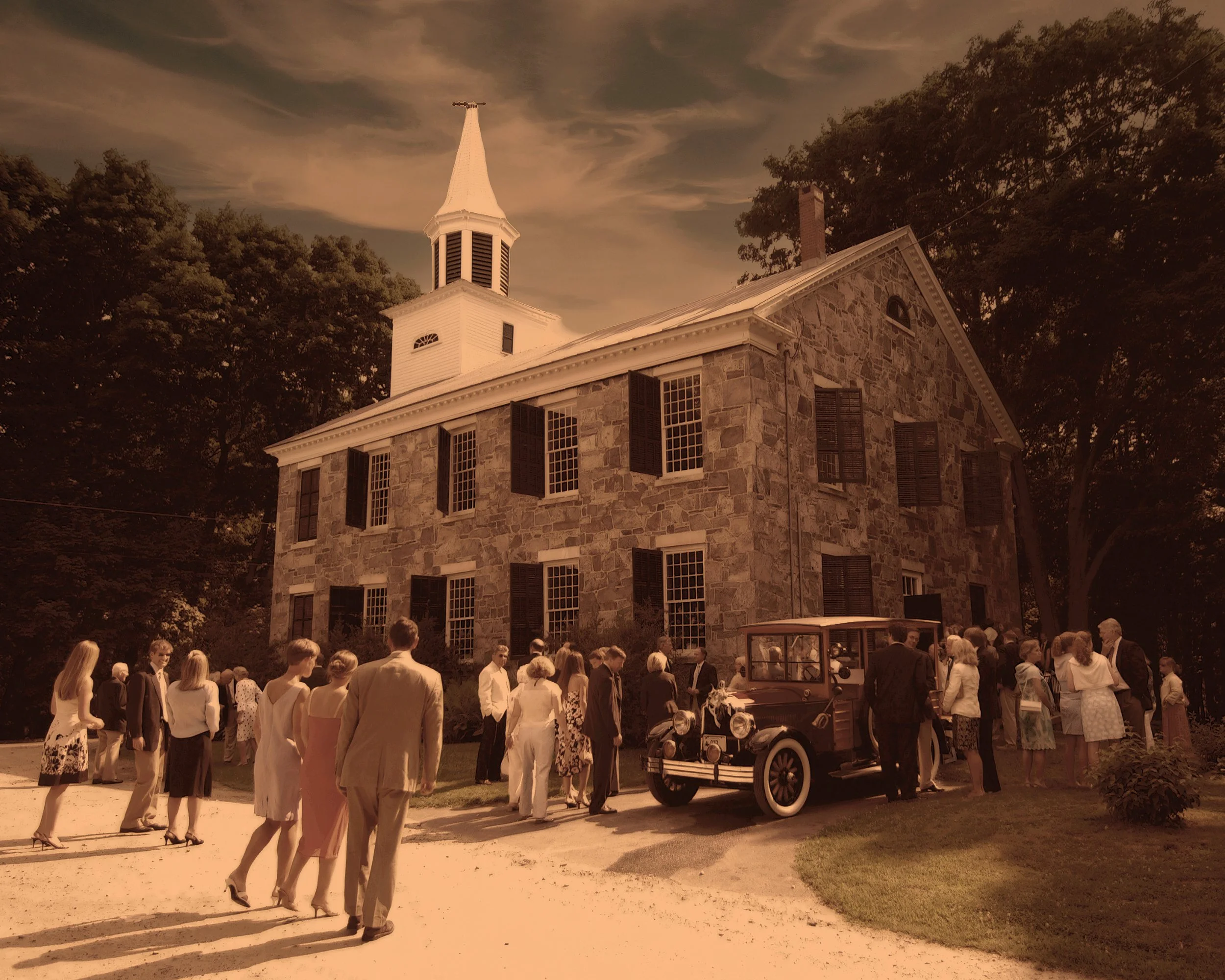 Guests arriving for a wedding ceremony at The Stone House Church and Meetinghouse in New Preston Connecticut.