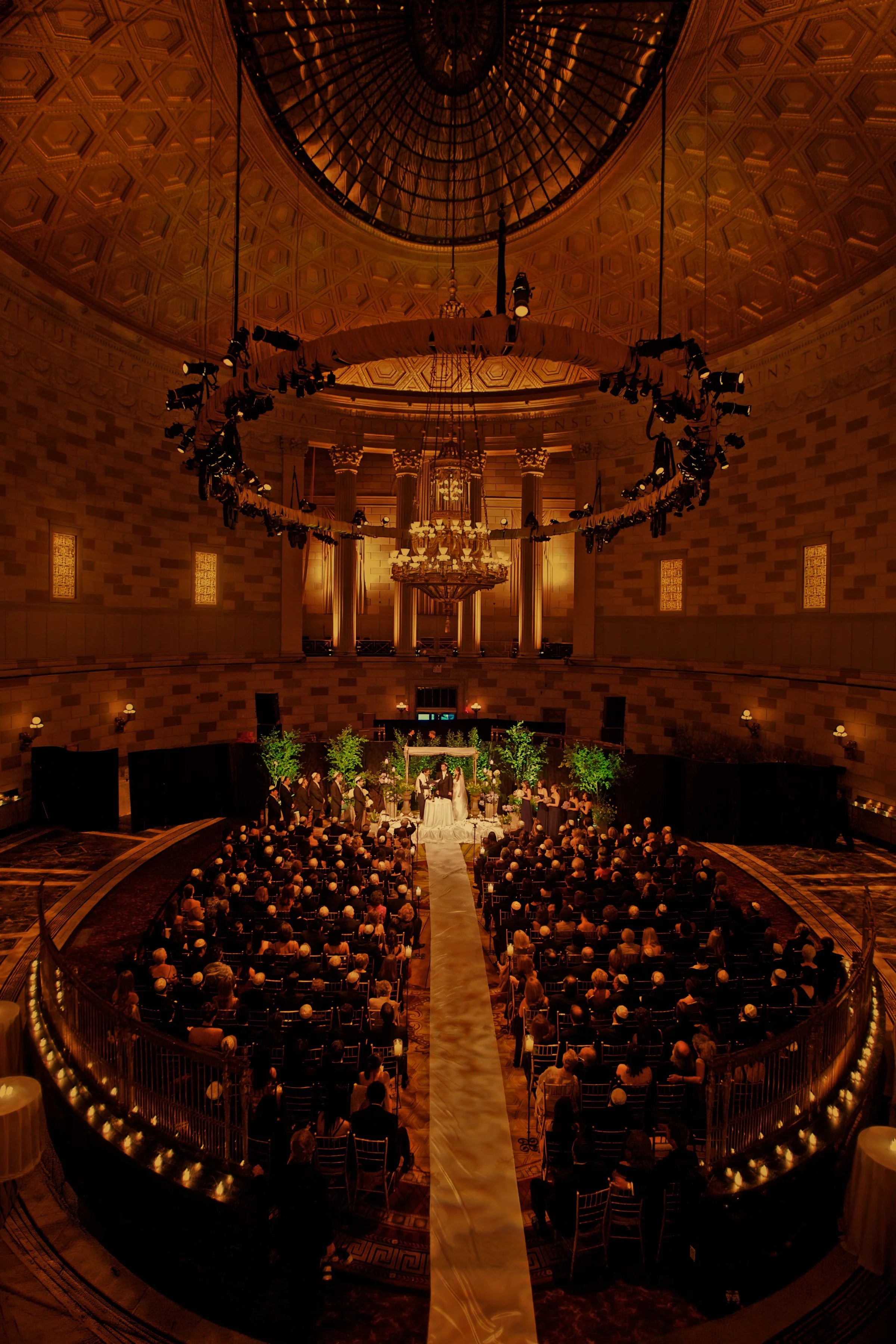 Overall balcony view of a wedding ceremony at Gotham Hall in Manhattan.