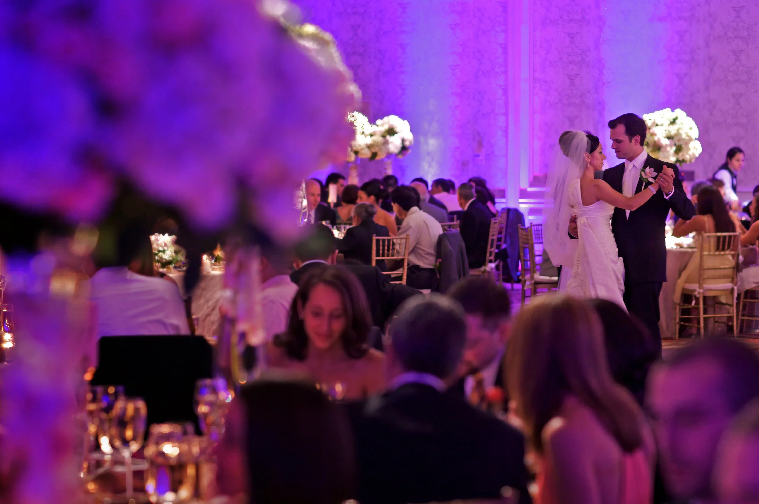 Bride and groom share a romantic dance during dinner at the Omni New Haven Hotel.