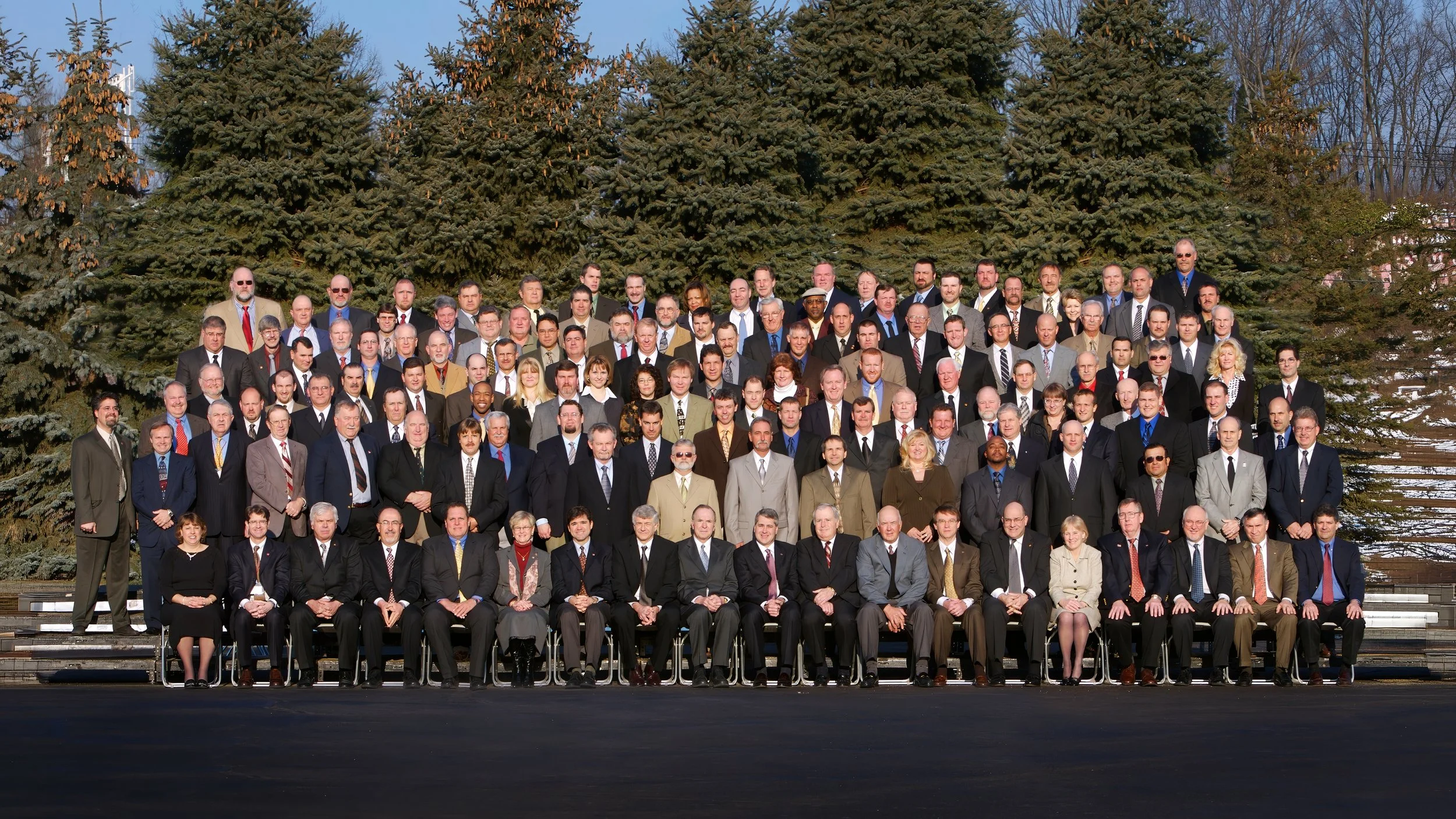 Large group photographs of executives