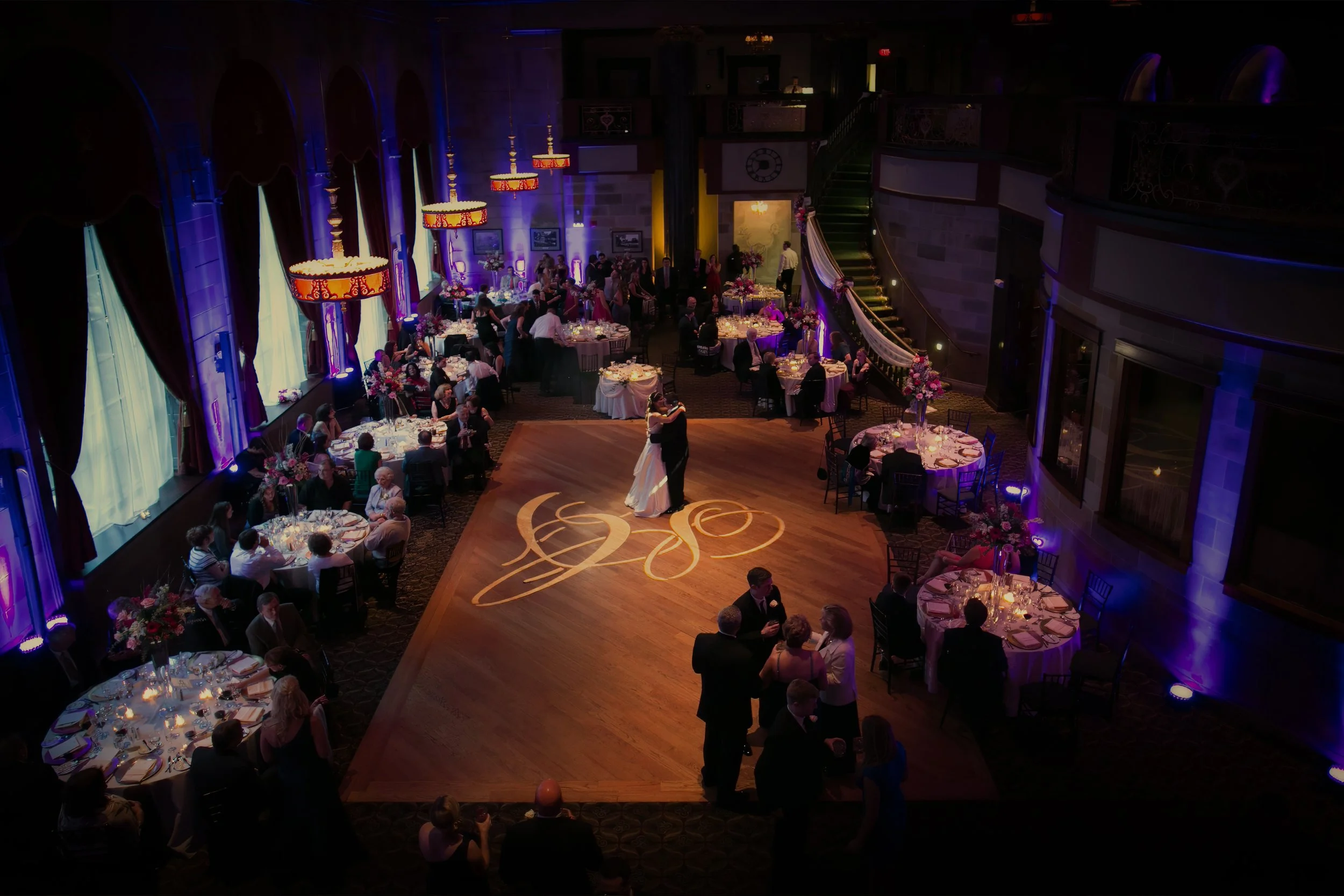 Wide view of bride and groom sharing their first dance in The Society Room ballroom in Hartford.