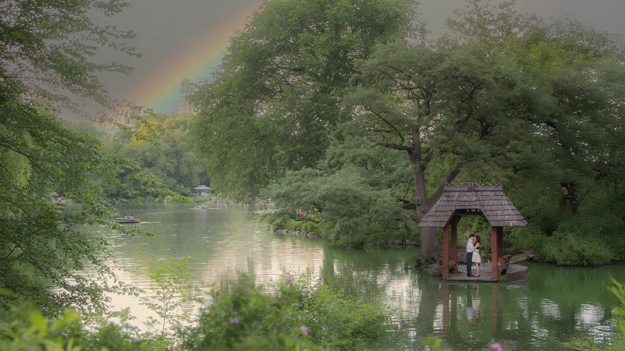 Wide scenic engagement portrait at Wagner Cove in Central Park, New York City by Maring Visuals