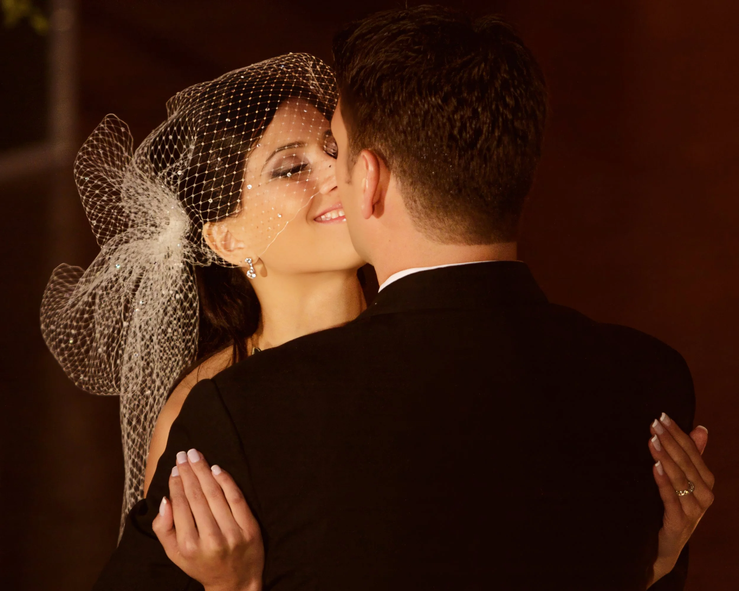 Emotional hug shared during a wedding ceremony at Angel Orensanz on the Lower East Side.
