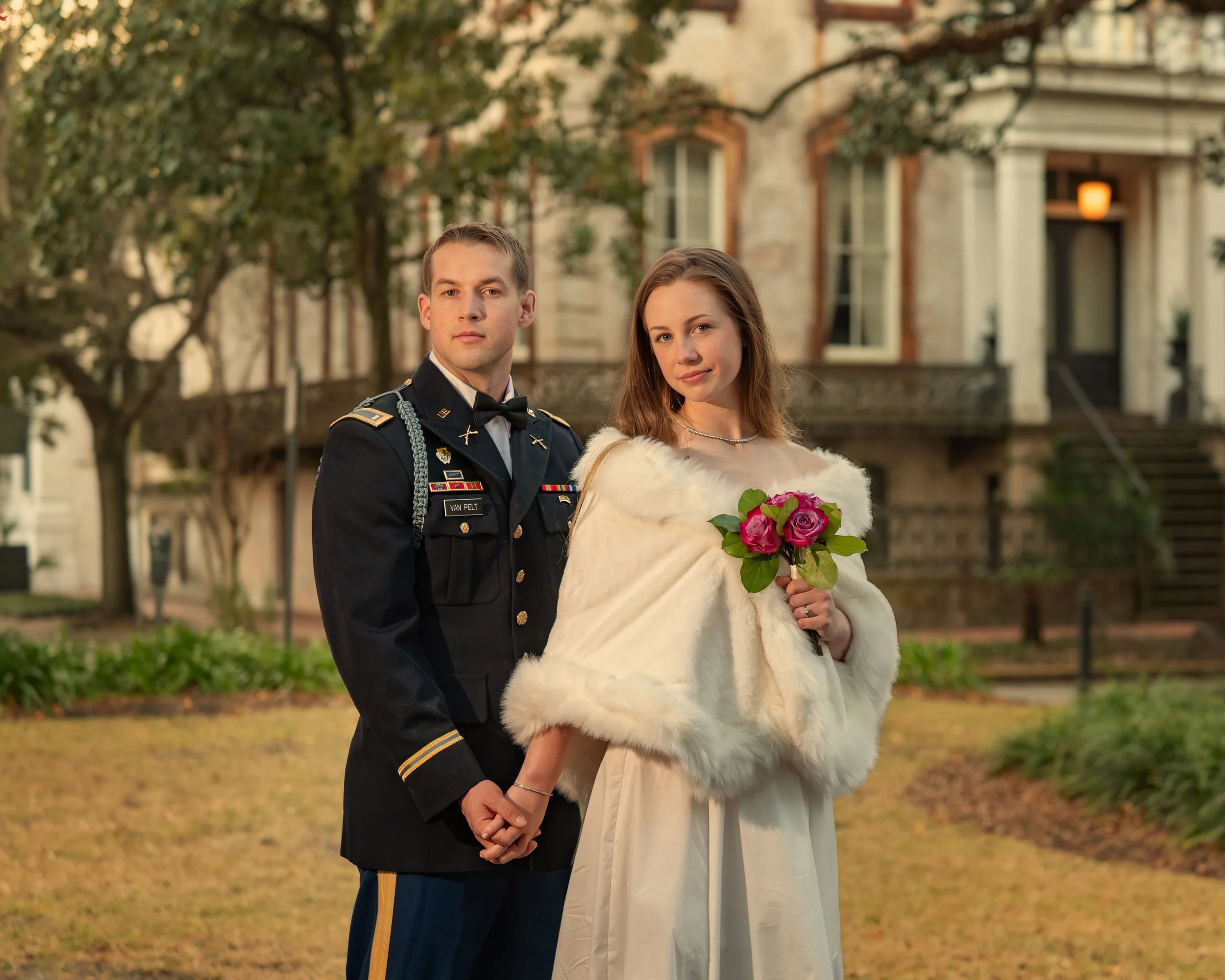 Bride and groom pose for a timeless legacy portrait in Monterey Square, just a block from Forsyth Park in Savannah, Georgia.
