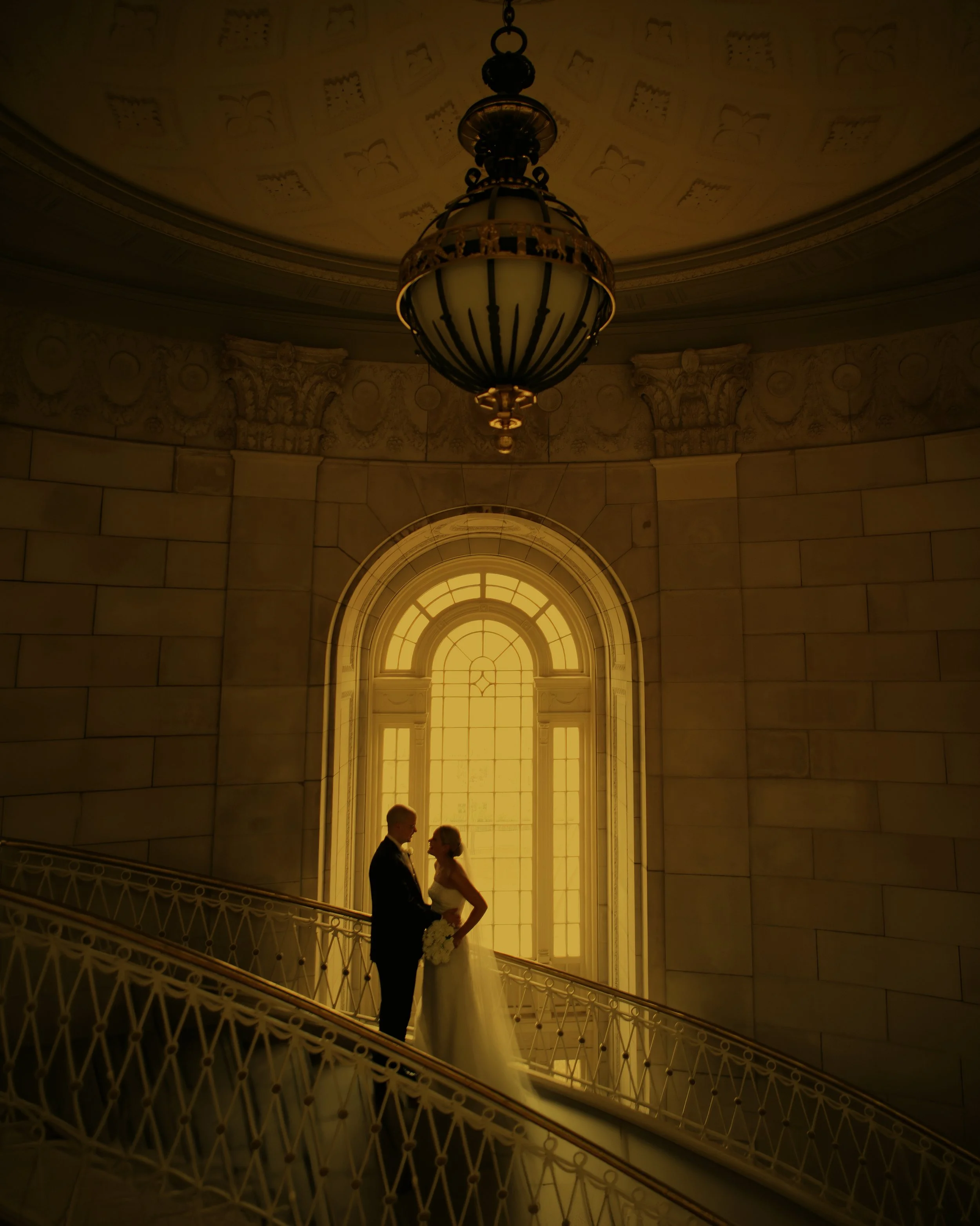 Fine art silhouette portrait of bride and groom at Hartford City Hall adjacent to Wadsworth Atheneum.