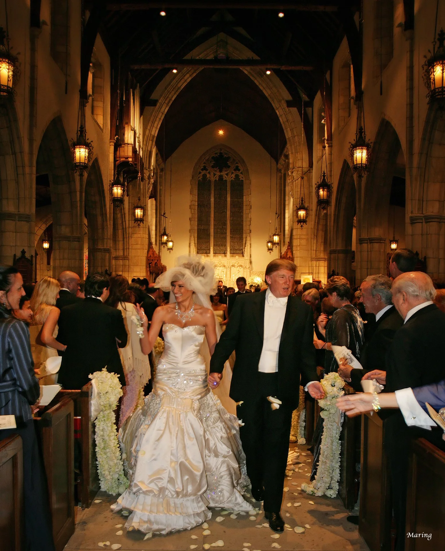 Donald and Melania Trump exit their wedding ceremony at Bethesda by the Sea church in Palm Beach Florida