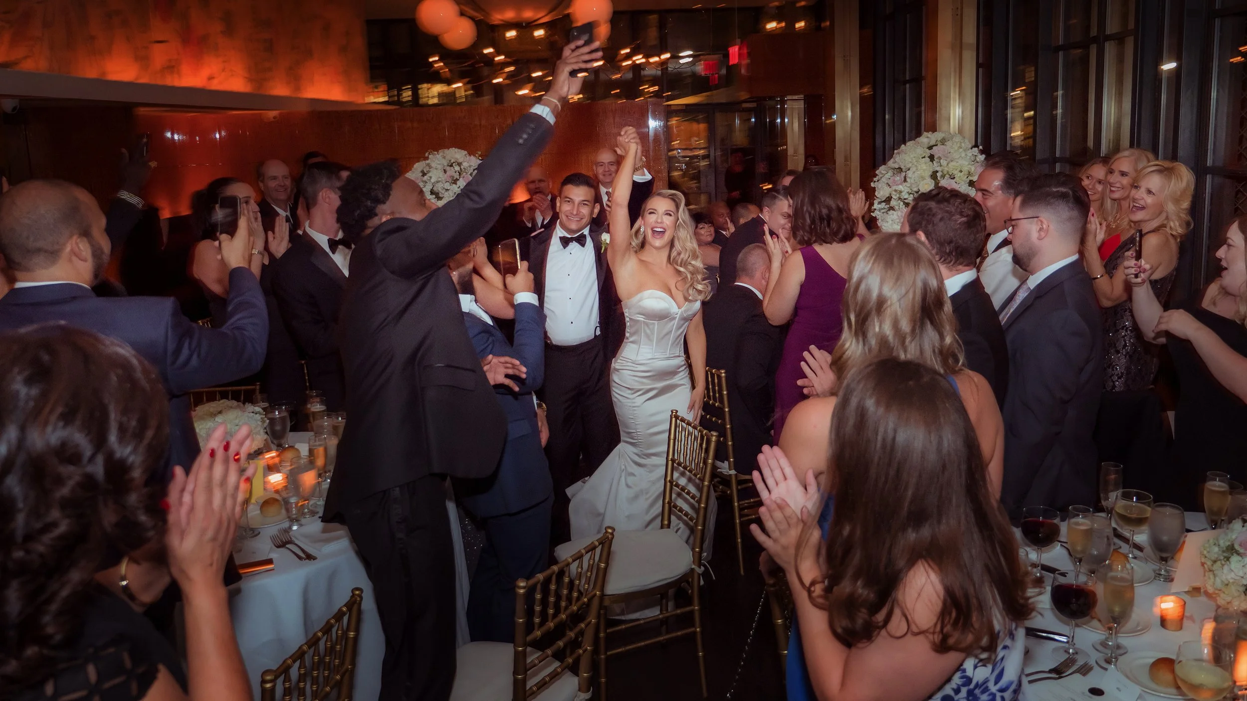 Bride and Groom are announced into the wedding reception at the Bryant Park Grill