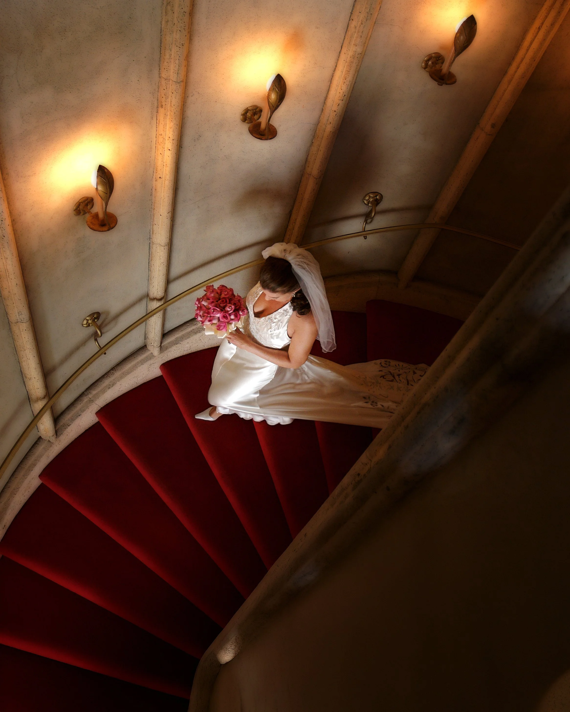 A bride walks down the stairs at a Mar-a-Lago Club Wedding