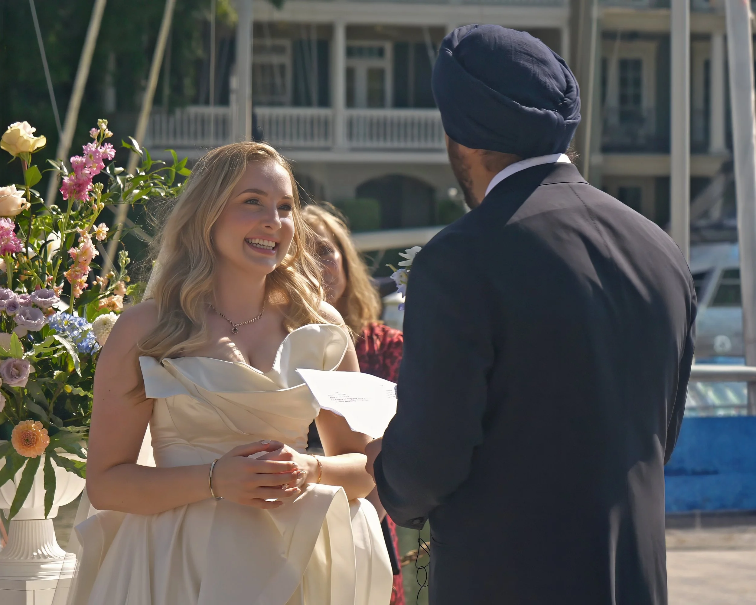 Bride smiling during groom vows at South Carolina Yacht Club wedding ceremony Hilton Head
