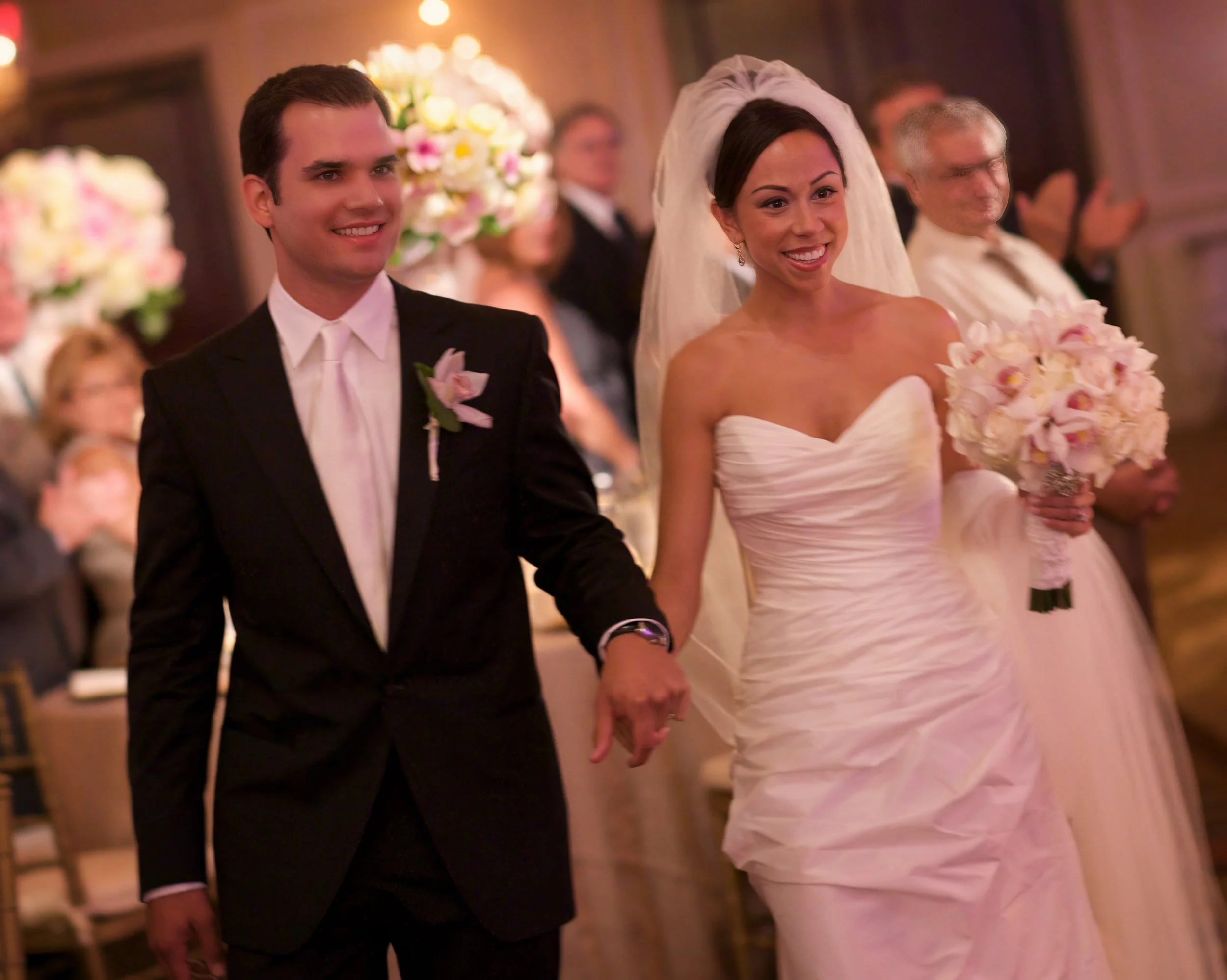 Closeup of bride and groom being announced into their wedding reception at the Omni Hotel New Haven.