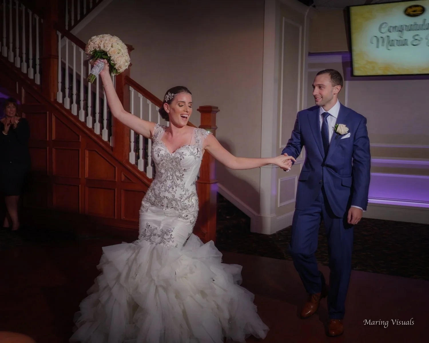 Bride and Groom enter their wedding reception at Anthony's Ocean View