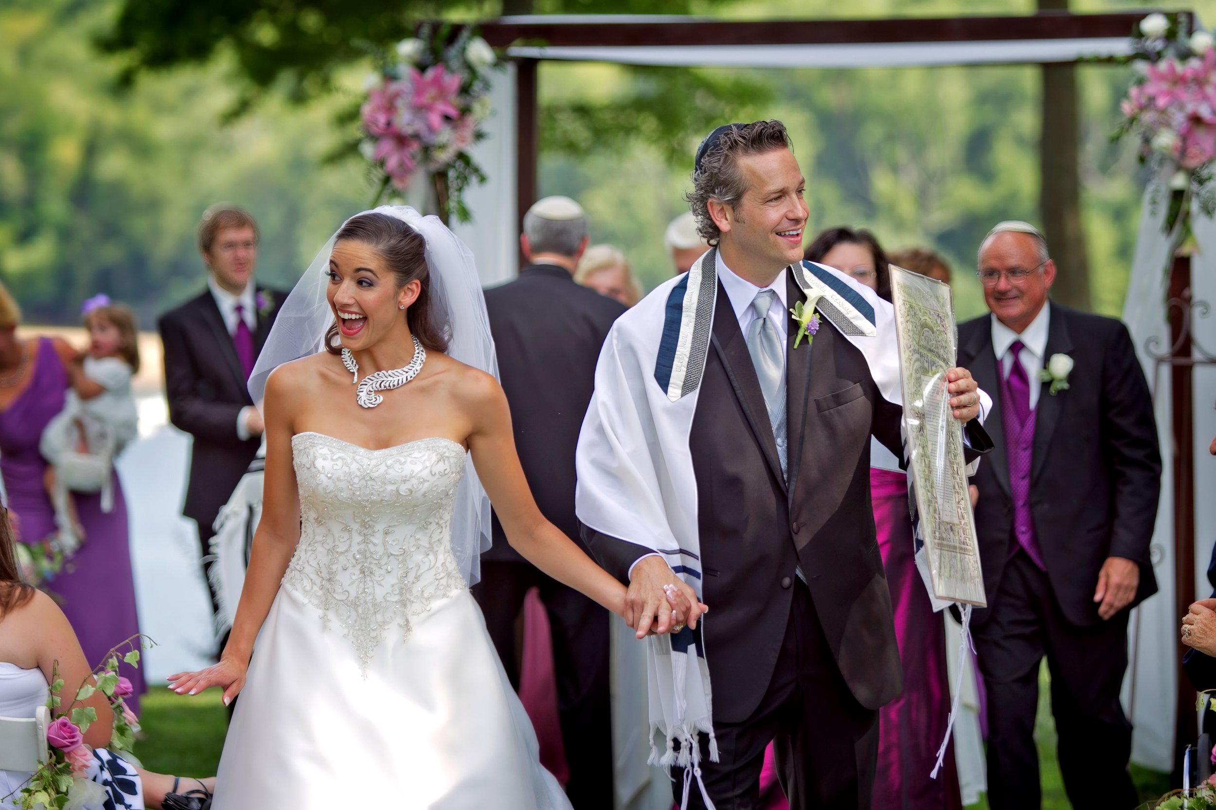 Wedding photojournalism recessional moment at Saint Clements Castle