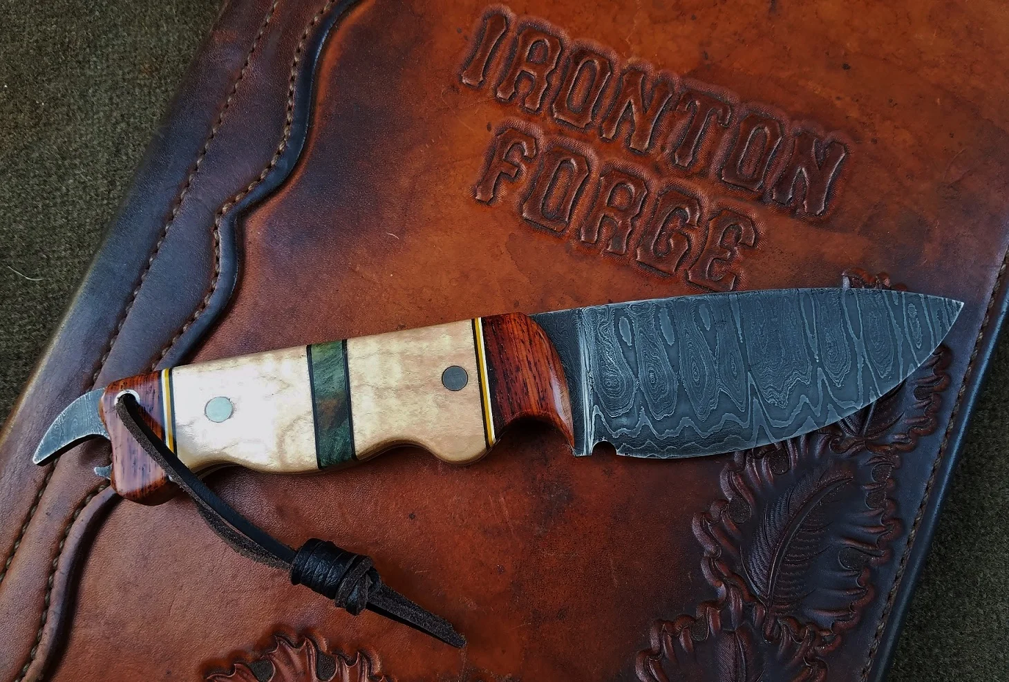 Damascus knife w/ bottle opener