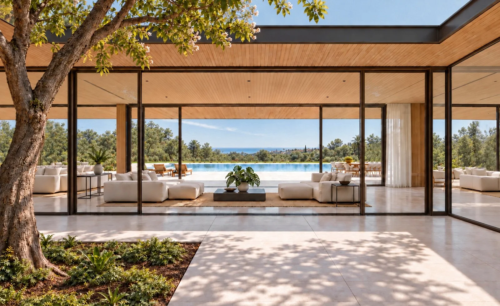 casa jaral, en estepona, patio interior con árbol y conexión con terraza y paisaje