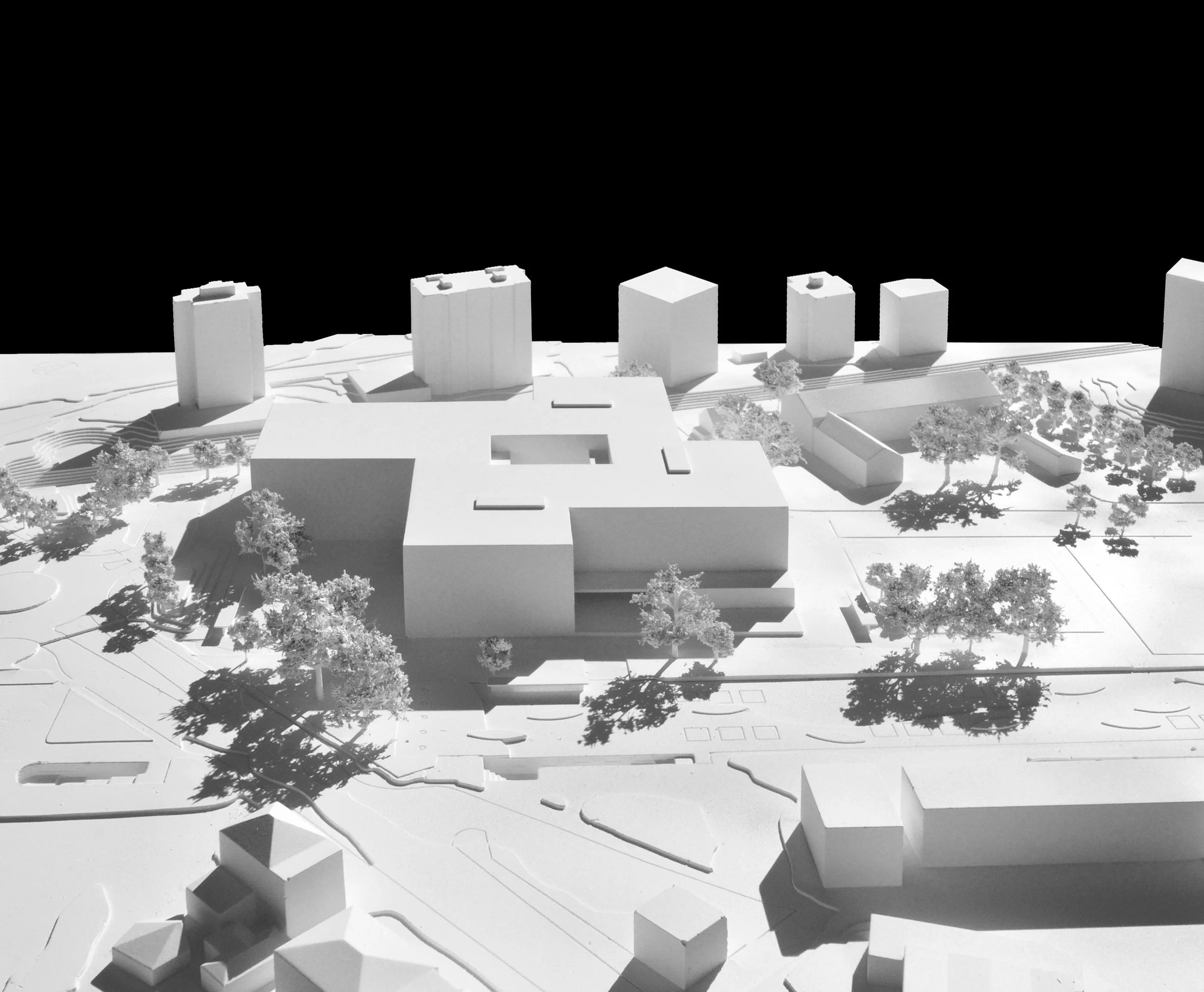 Architectural scale model of an urban development, showing buildings, public spaces and circulation layouts for project planning and design
