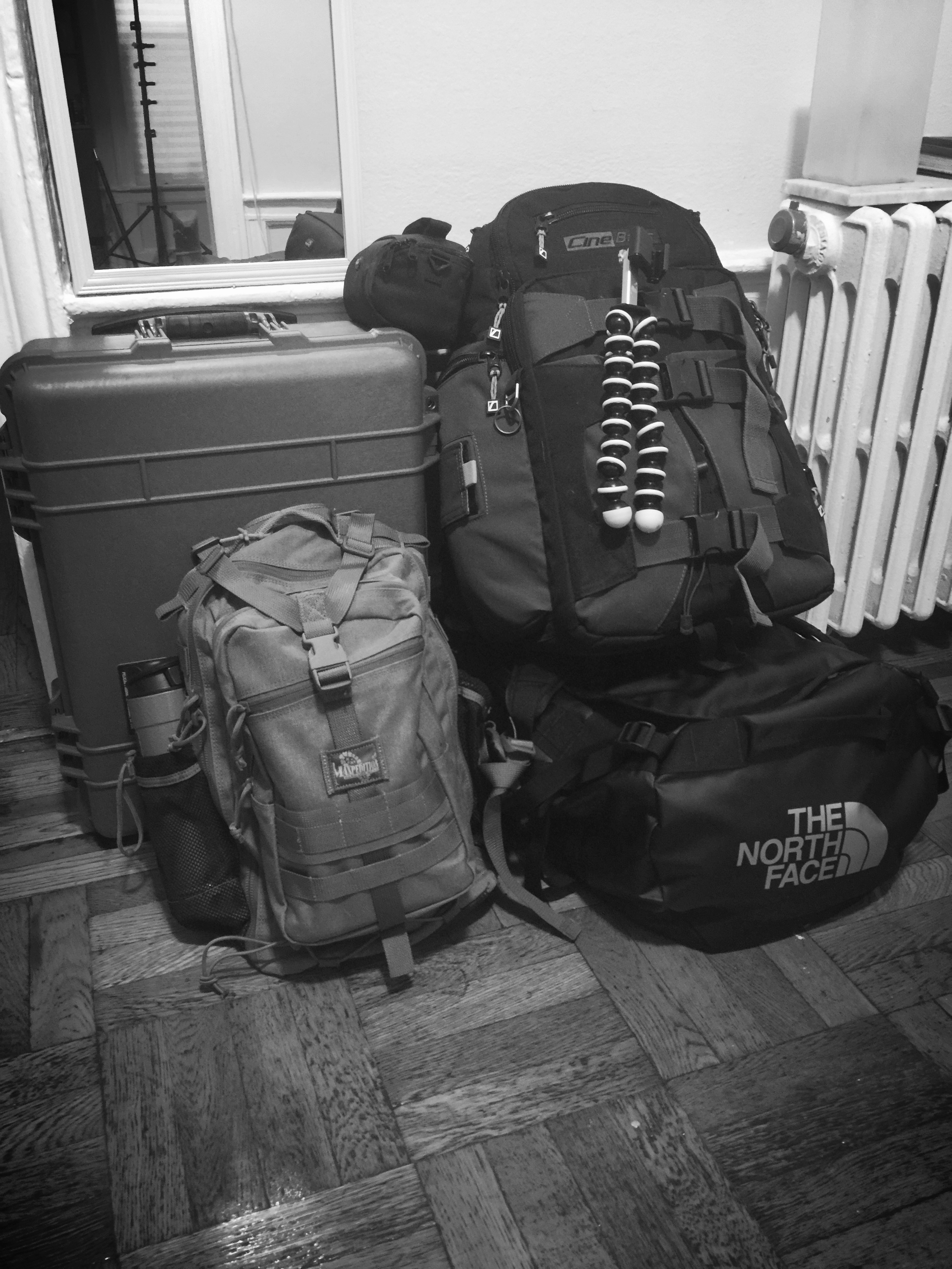 FOOD FOR THOUGHT: This is what overpacking looks like. On my last trip, 75% of this gear didn't get used. Everything that did fit into the bag on the bottom left. 
