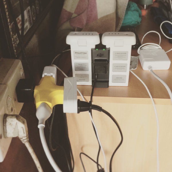 This little fire-hazard situation was the result of poor planning. Due to a shortage of proper outlet adapters charging capacity was in short supply. A little ingenuity solved the problem but not before blowing a few fuses through trial and error.