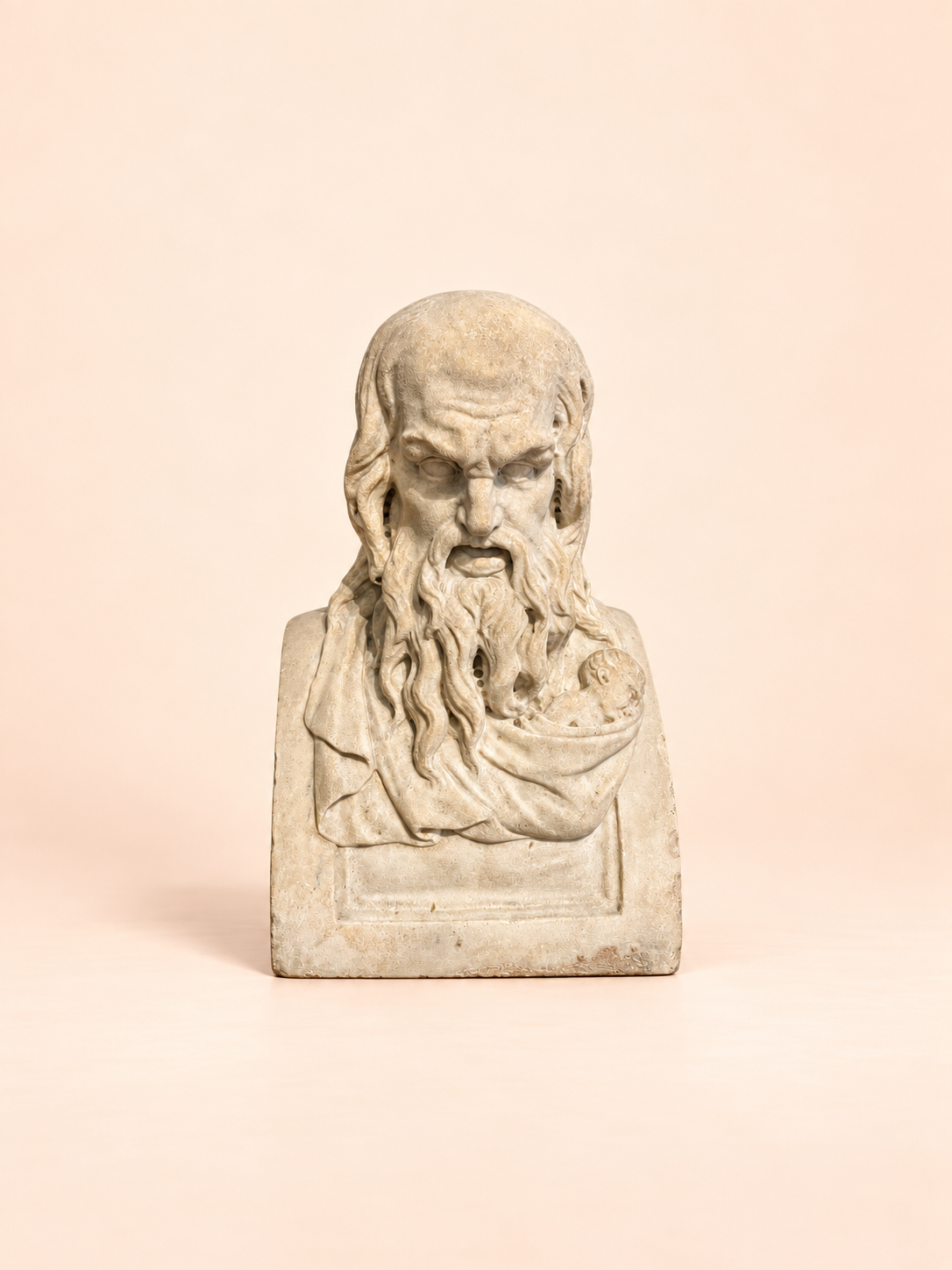 Weathered Stone Bust on Pale Apricot.png