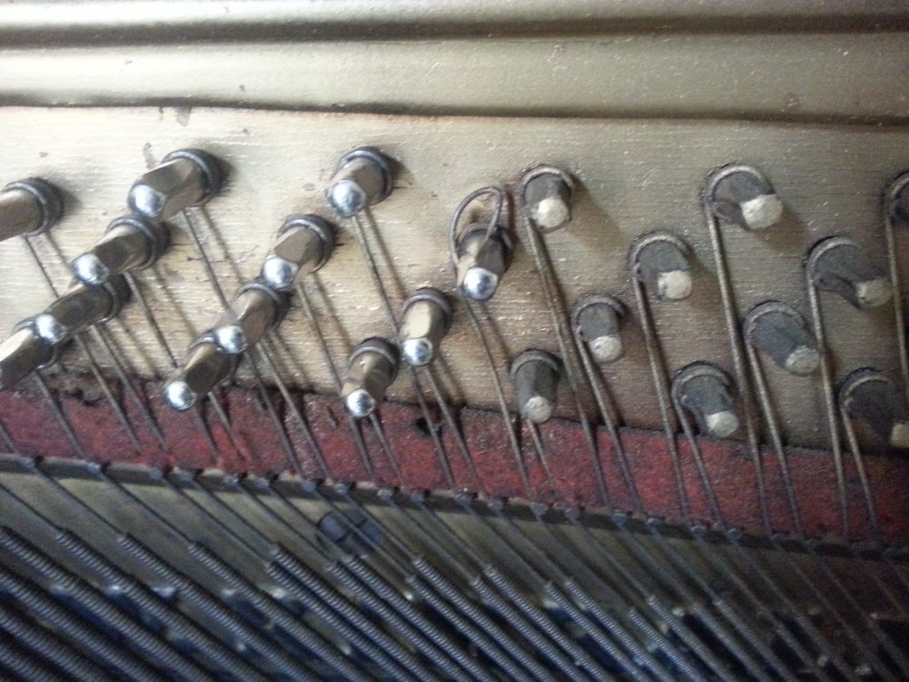 Placing the coil on the new pin.