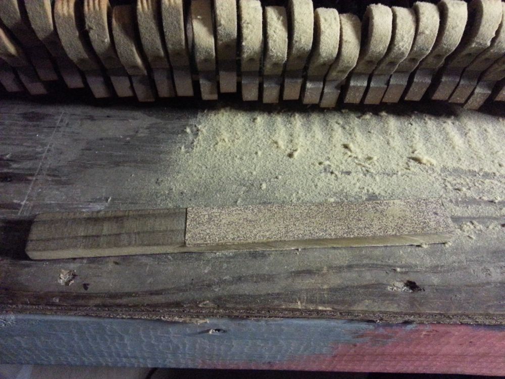 A hammer sanding block.