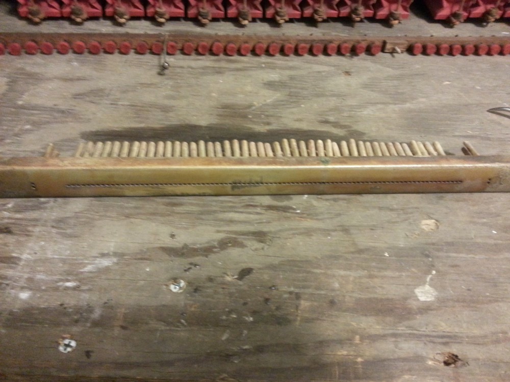 The removed tracker bar ready for cleaning.