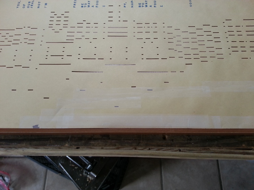 The tape has covered up some of the note-playing holes.