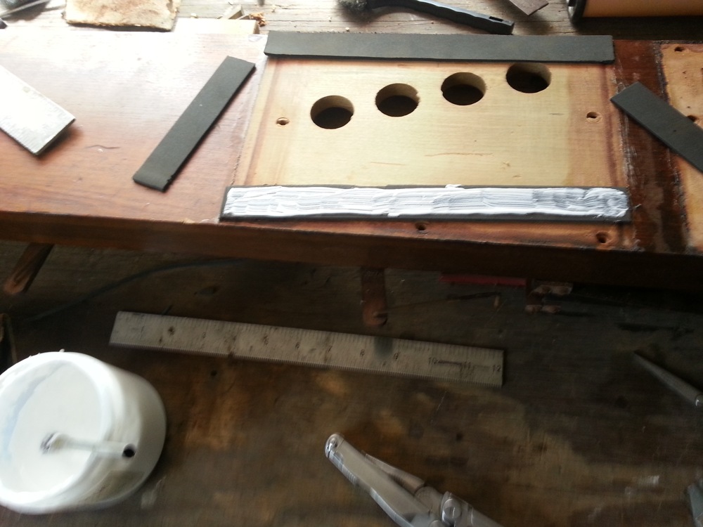 Applying PVC-E glue to the gasket.
