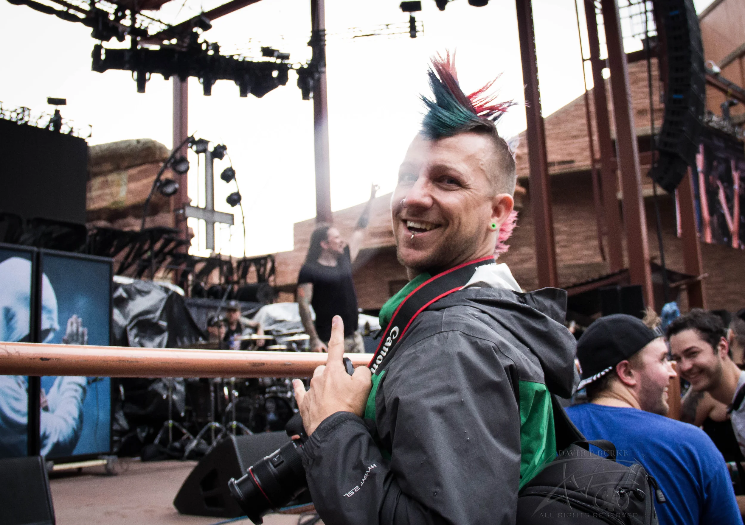 Fellow photographer Andy Hollingsworth getting poured on with me photo: David Burke