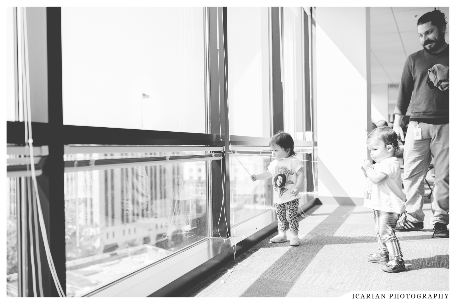 The sun was shining so brightly on your face here, Ruby. But, I wanted you both to see how elated your dad was to have you two (and mommy) come spend time with him at his office.