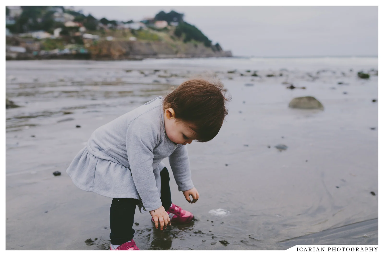 Ru, tactile one you are, immediately dug your hands into the freezing, wet sand. I was sure you'd begin to cry.