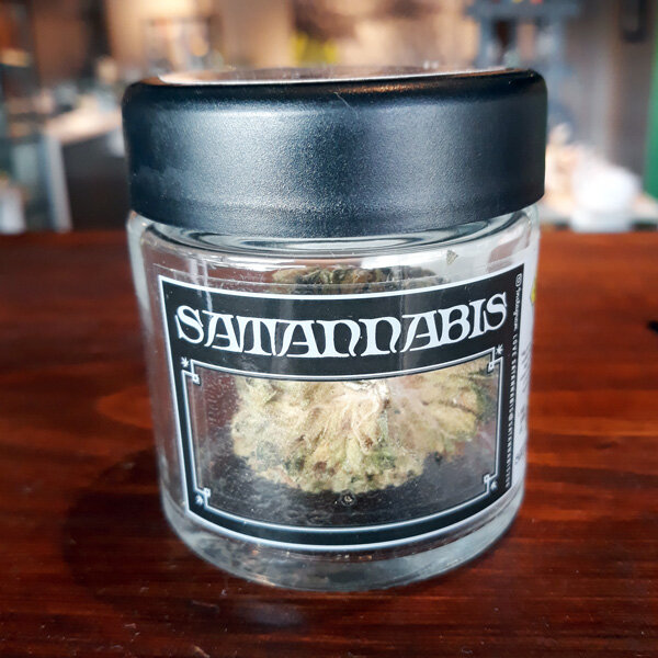 Diesel Cookies by Satannabis - Hybrid | 21% THCWith a limited engagement on The Novel Tree’s menu during the month of SPOOKTACULAR!, Satannabis brings a decidedly dark addition to the list of high THC strains. Diesel Cookies is a strong and sedating strain great for couch time with your favorite horror flick!
