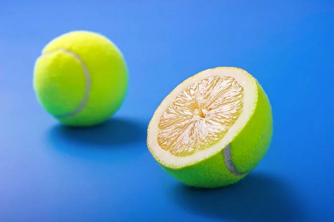 Lemon-Tennis-Balls-on-Blue-Background-by-Cristi-Kerekes.jpg