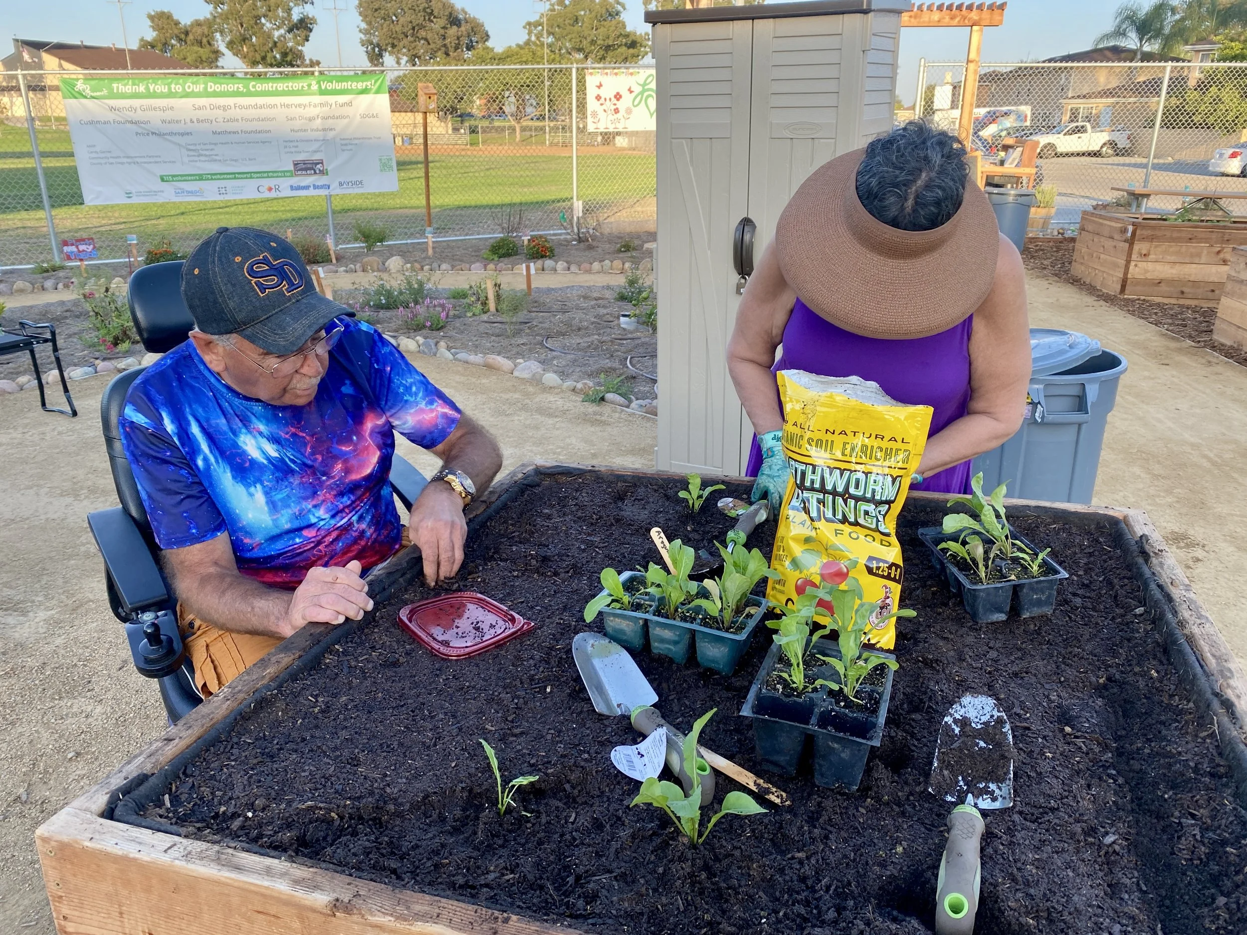 Robert Planting Senior Coop Beds 9_24.jpg